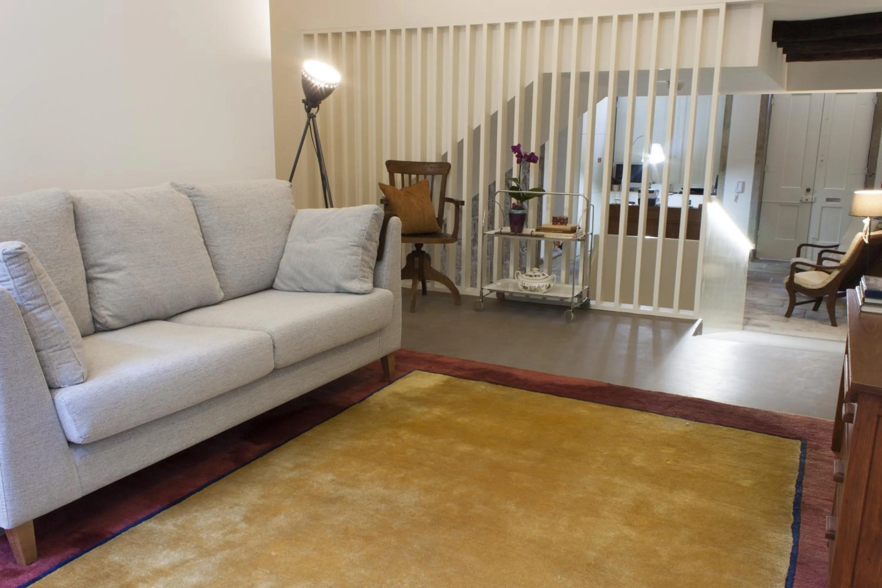 Communal lounge/ TV room in Being Porto Hostel