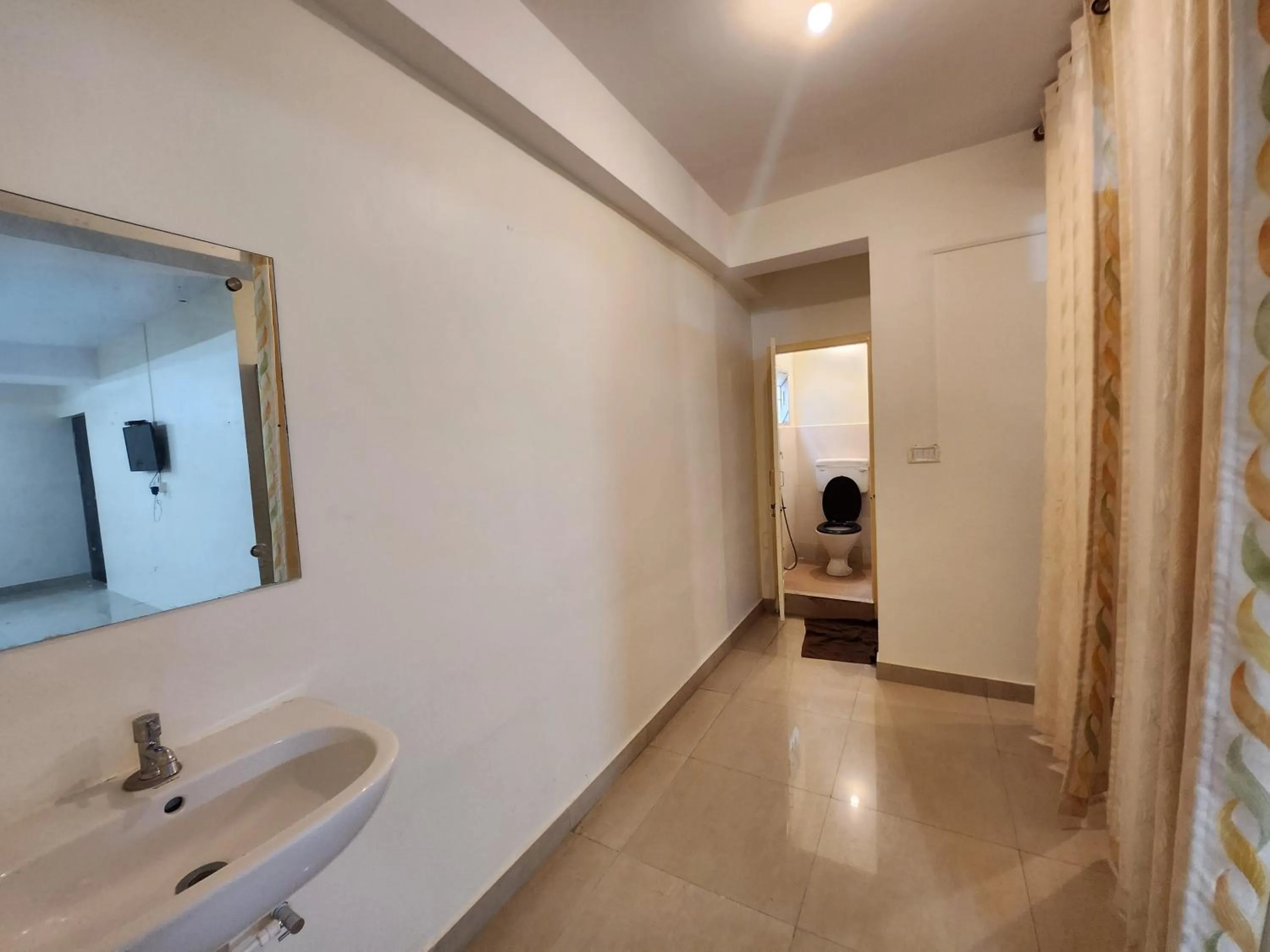 Toilet in Suvarna Residency