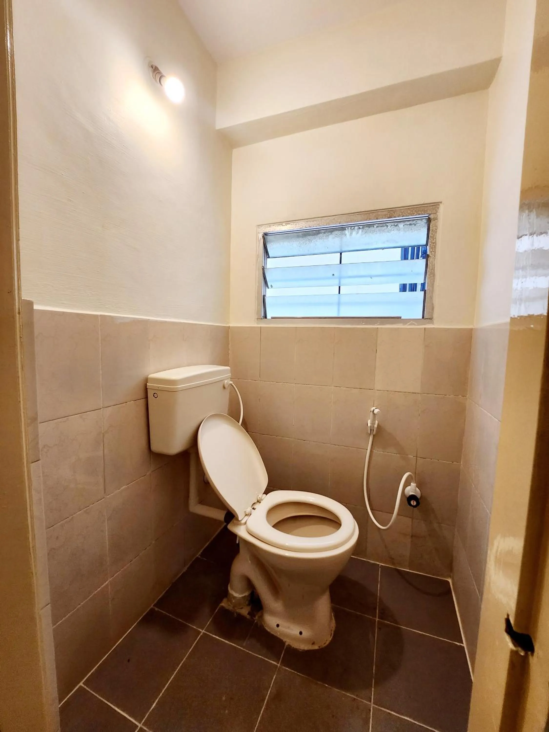 Toilet in Suvarna Residency