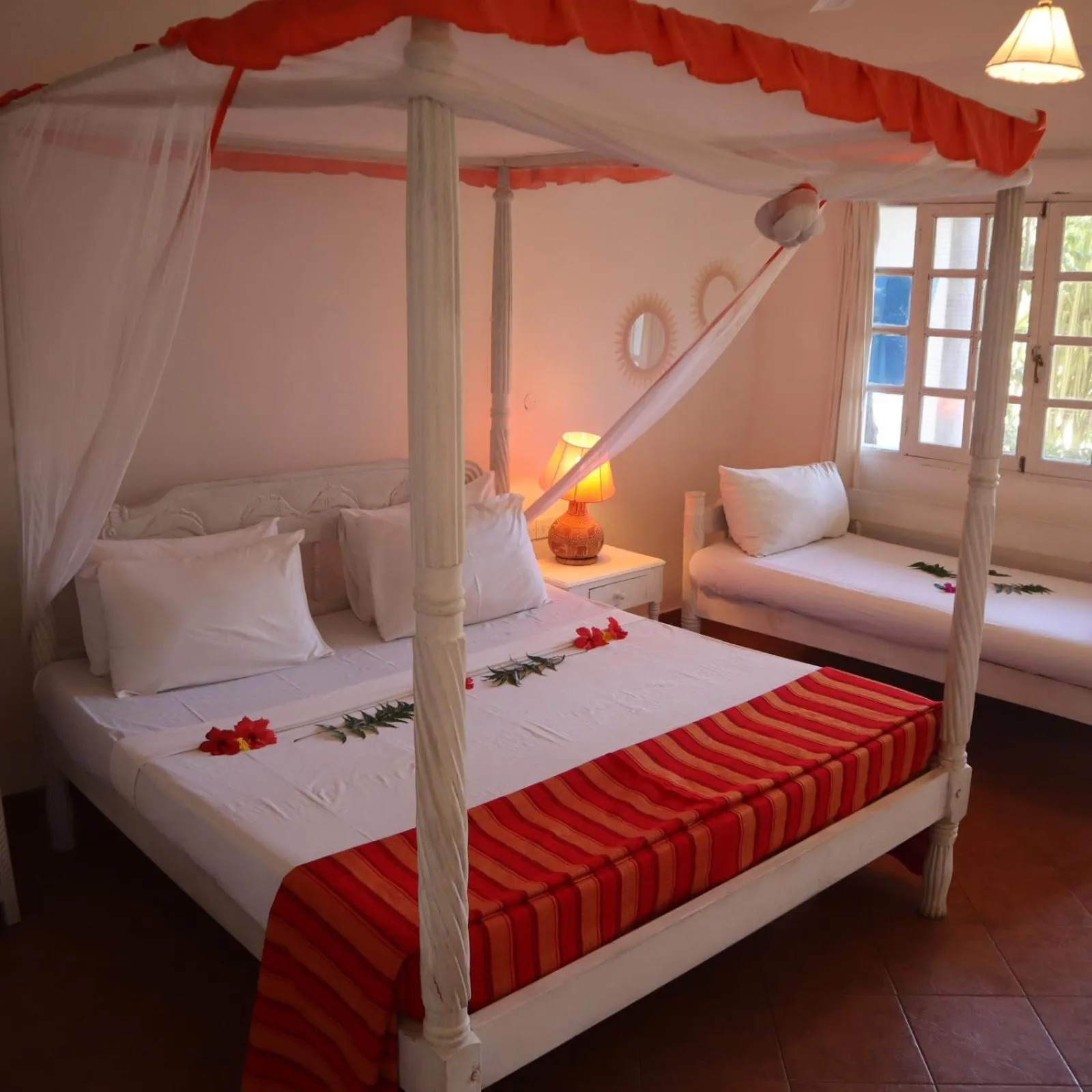 Bed in Lily Palm Resort