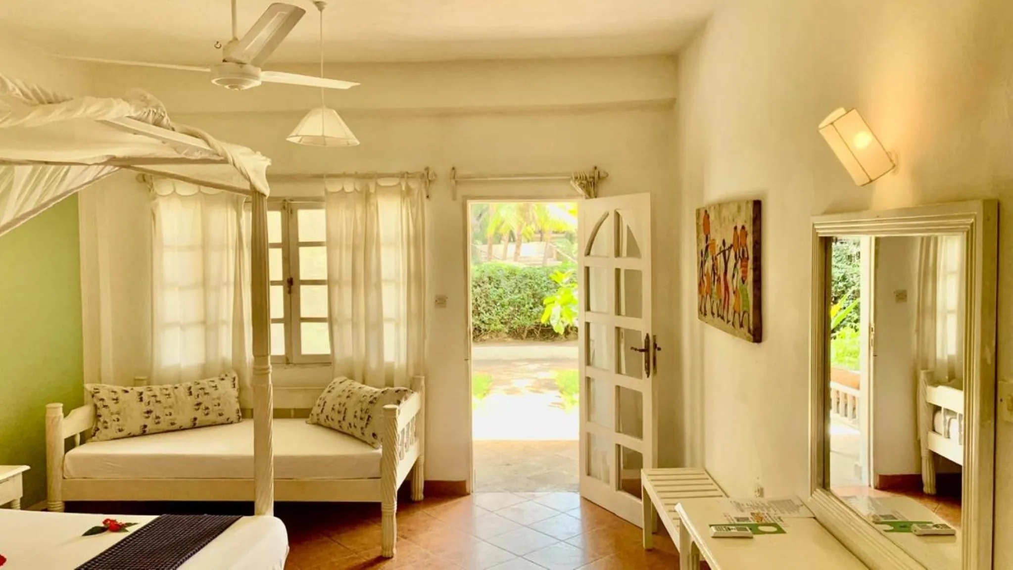 Seating area, Bed in Lily Palm Resort