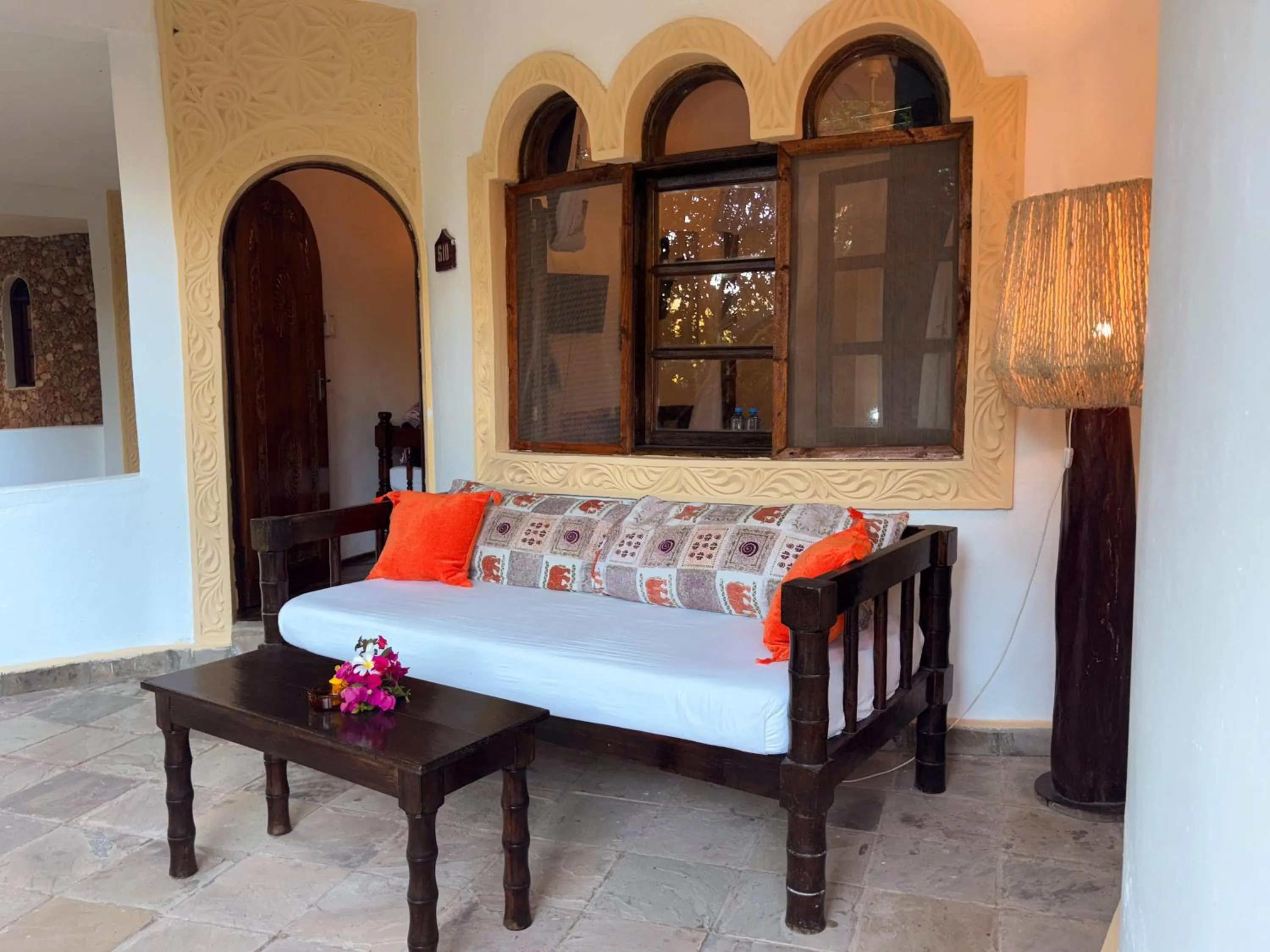 Bed in Lily Palm Resort