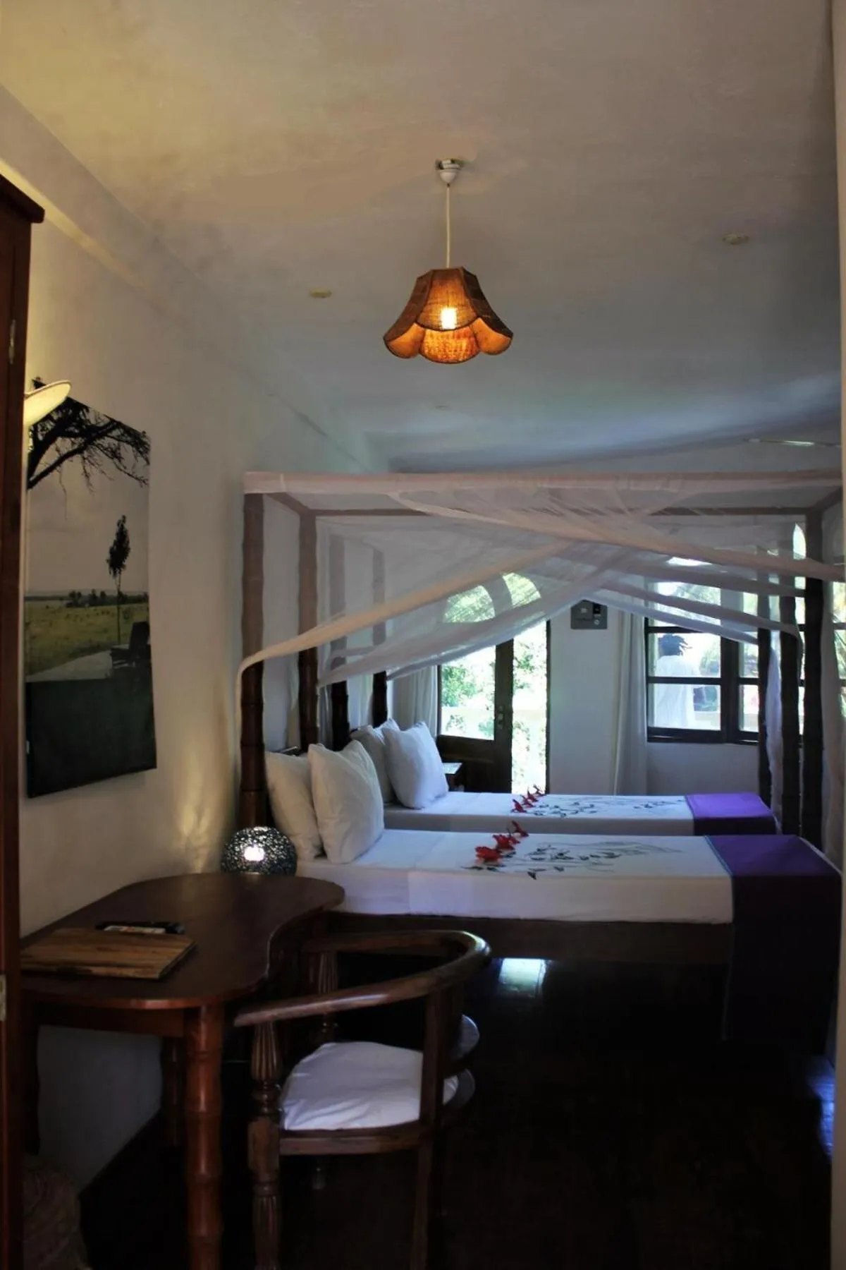 Bed in Lily Palm Resort