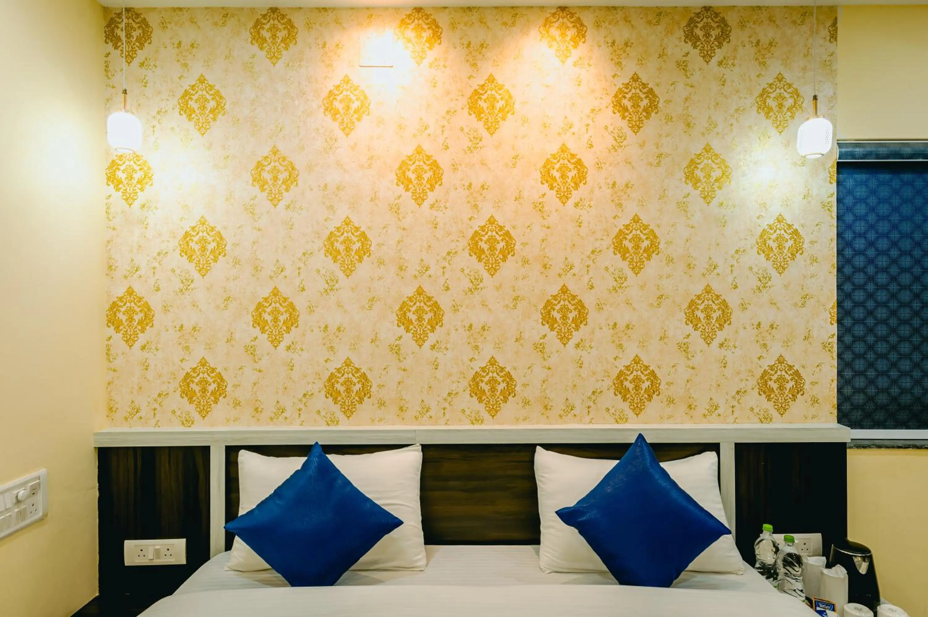 Bed in Livotel Premium Hotel