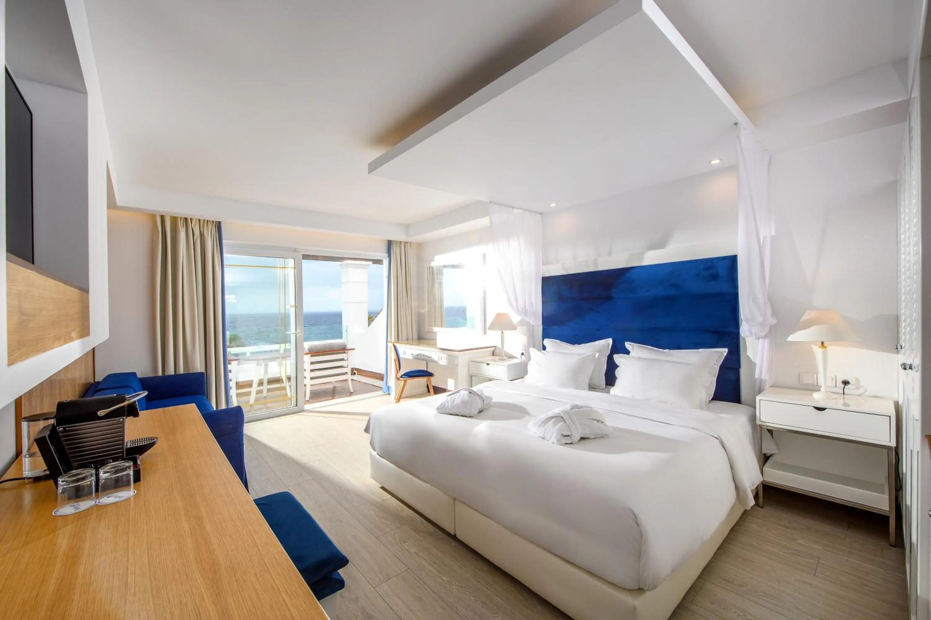 Bed in Minos Imperial Luxury Beach Resort & Spa Milatos