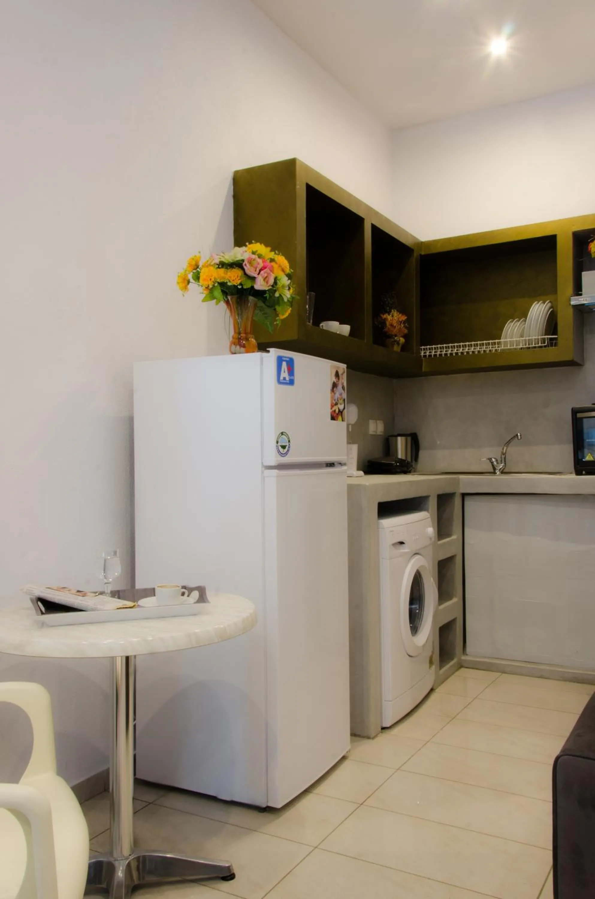 Kitchen or kitchenette in Polykratis Rooms