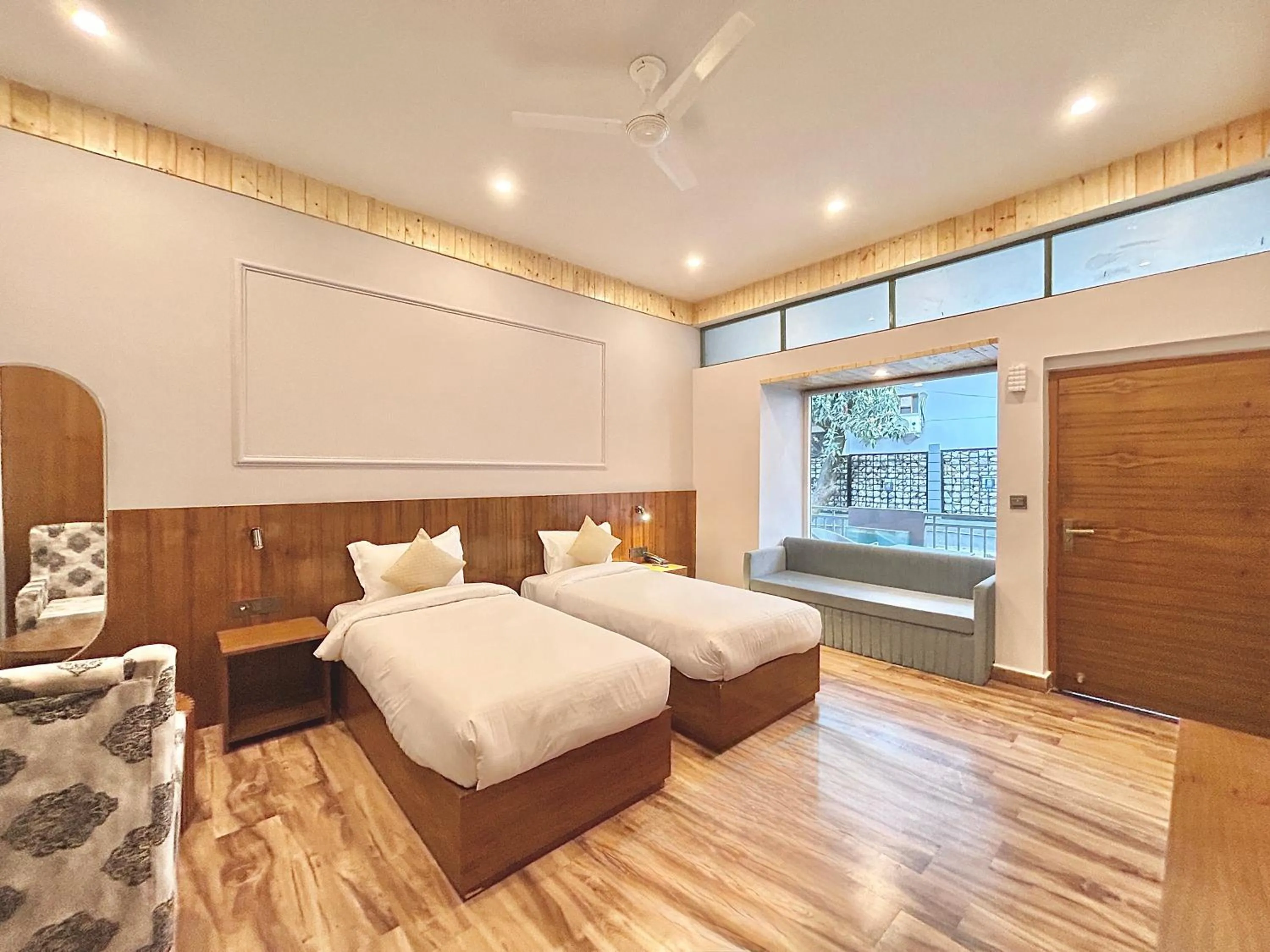 Bed in Ravihans Aranyam - Resort & Restaurant