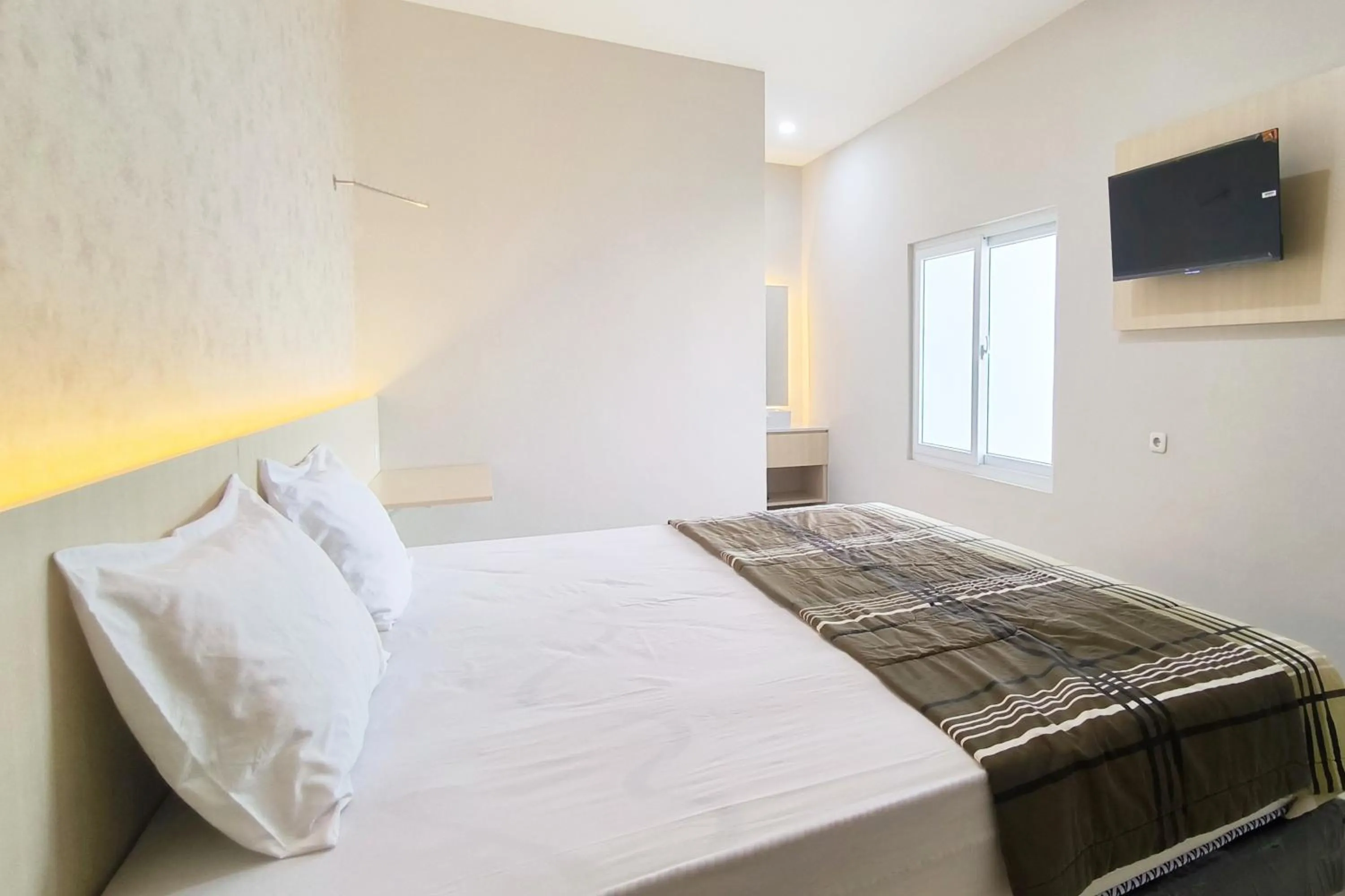 Bed in Tumesa Guesthouse Syariah 2