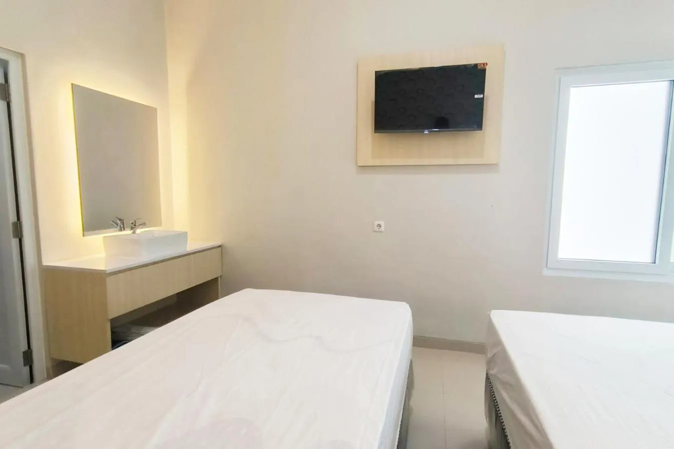 Bed in Tumesa Guesthouse Syariah 2