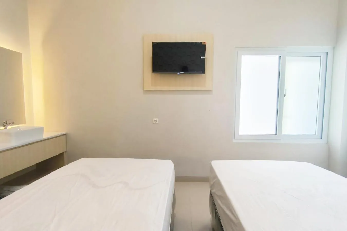 Bed in Tumesa Guesthouse Syariah 2