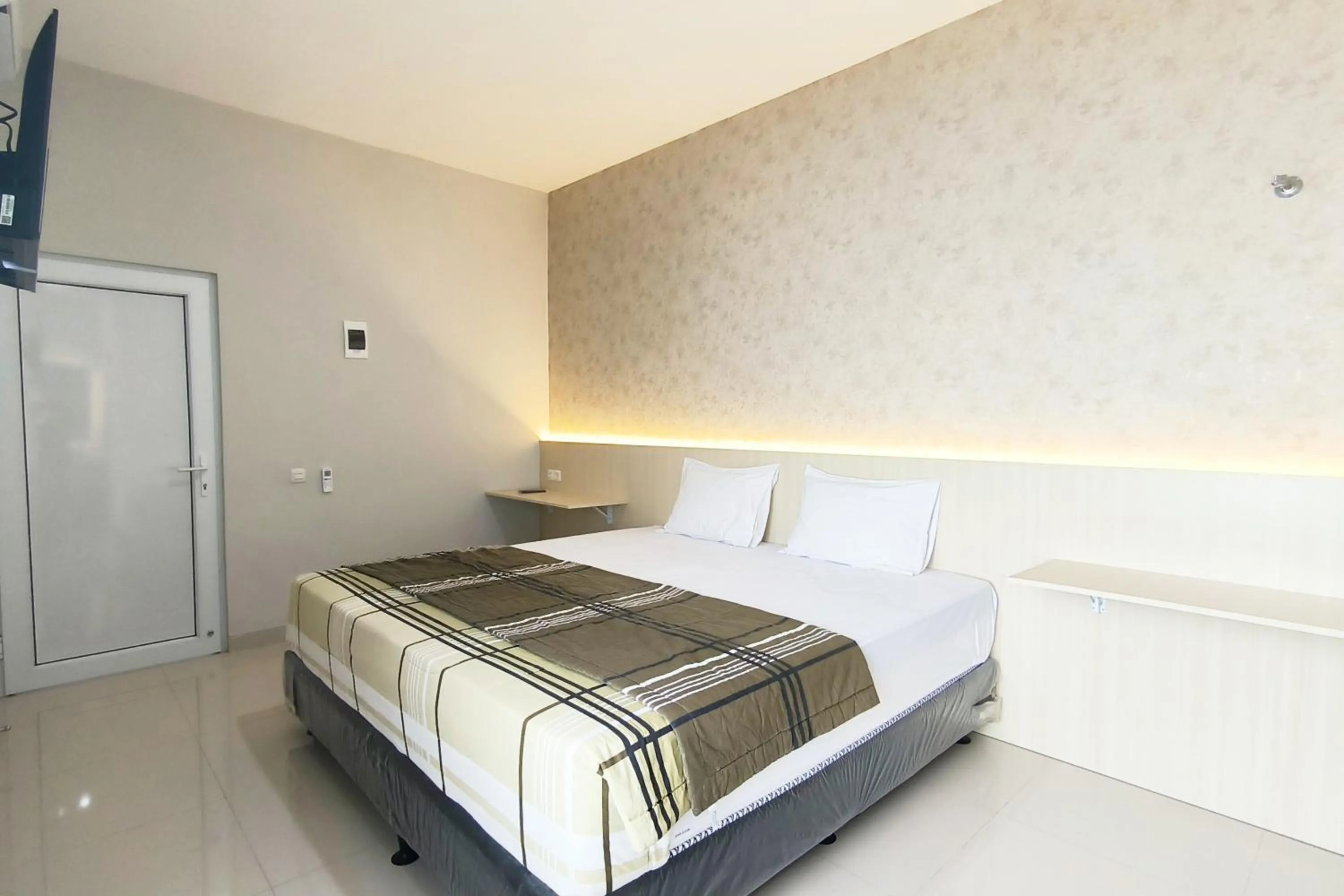 Bed in Tumesa Guesthouse Syariah 2