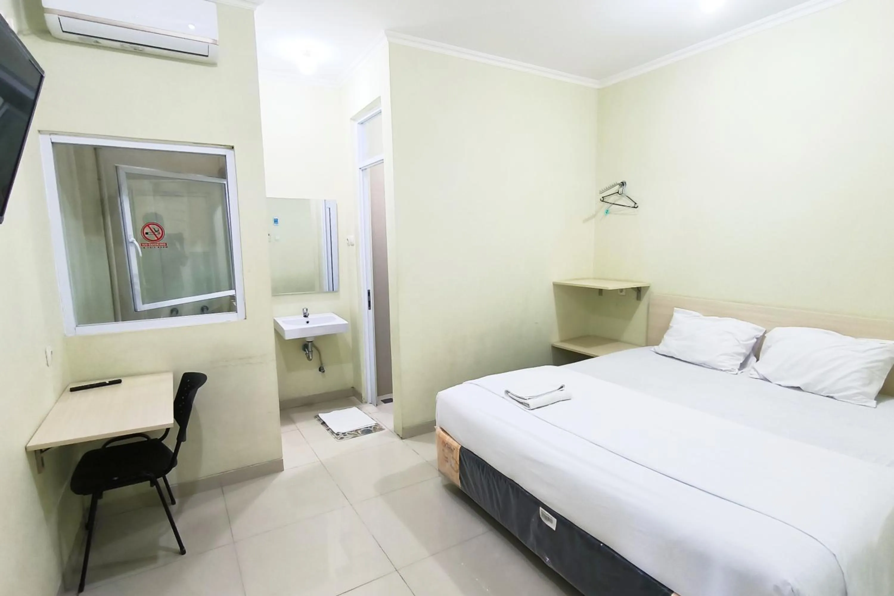 Bed in Tumesa Guesthouse Syariah 2