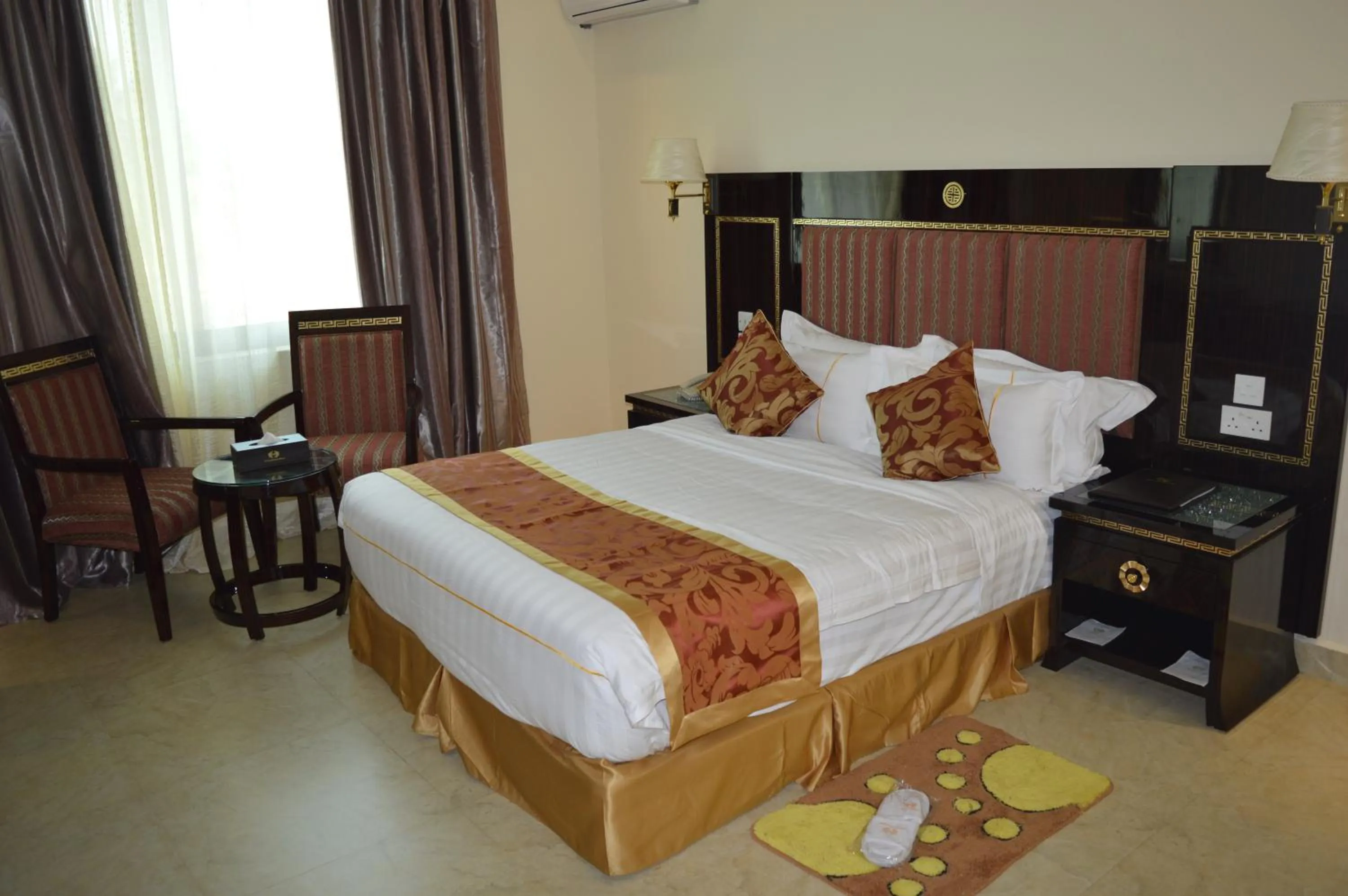 Photo of the whole room, Bed in Tiffany Diamond Hotels - Mtwara