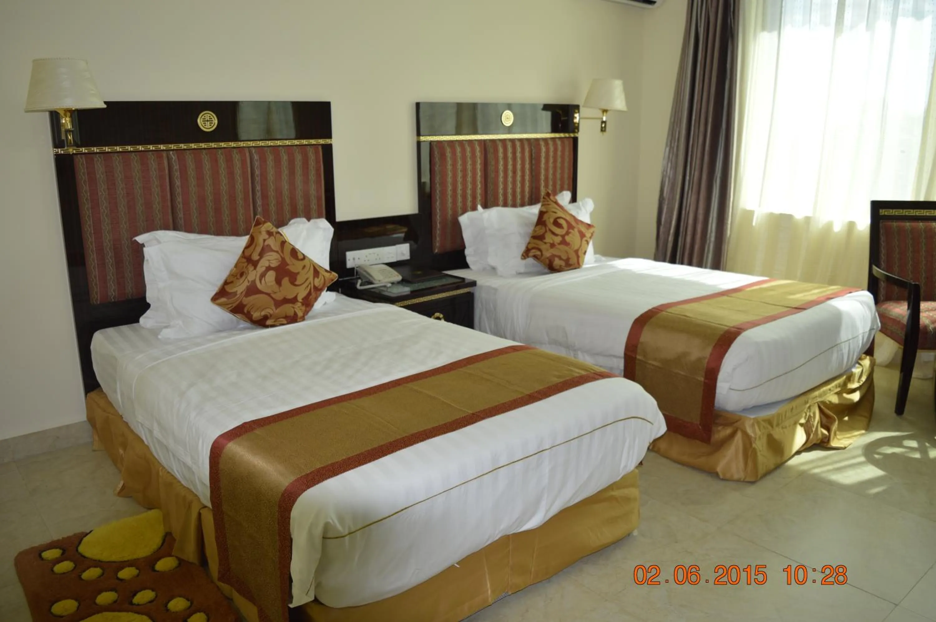 Bed in Tiffany Diamond Hotels - Mtwara