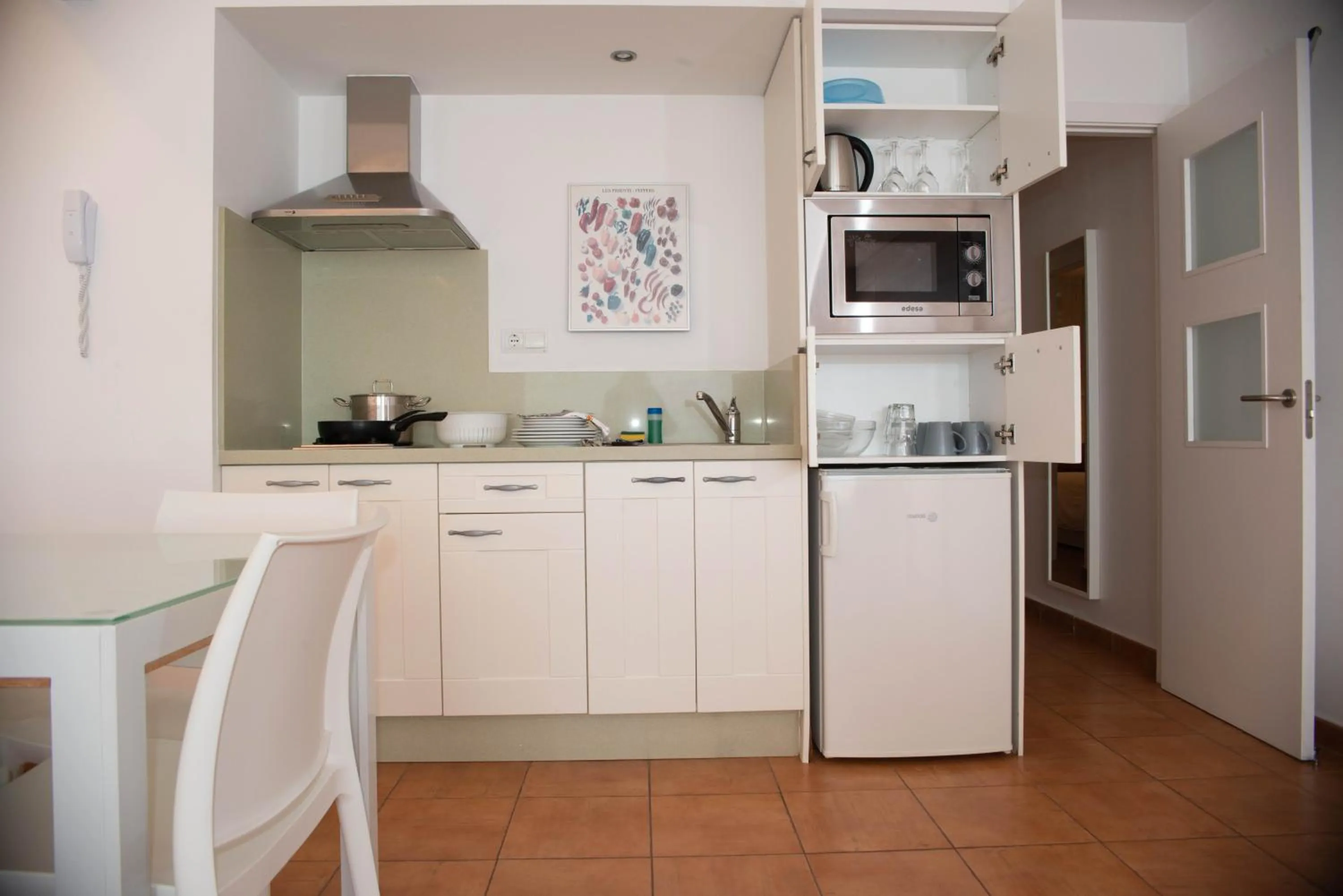 Kitchen or kitchenette in Apartamentos Llobet Ibiza
