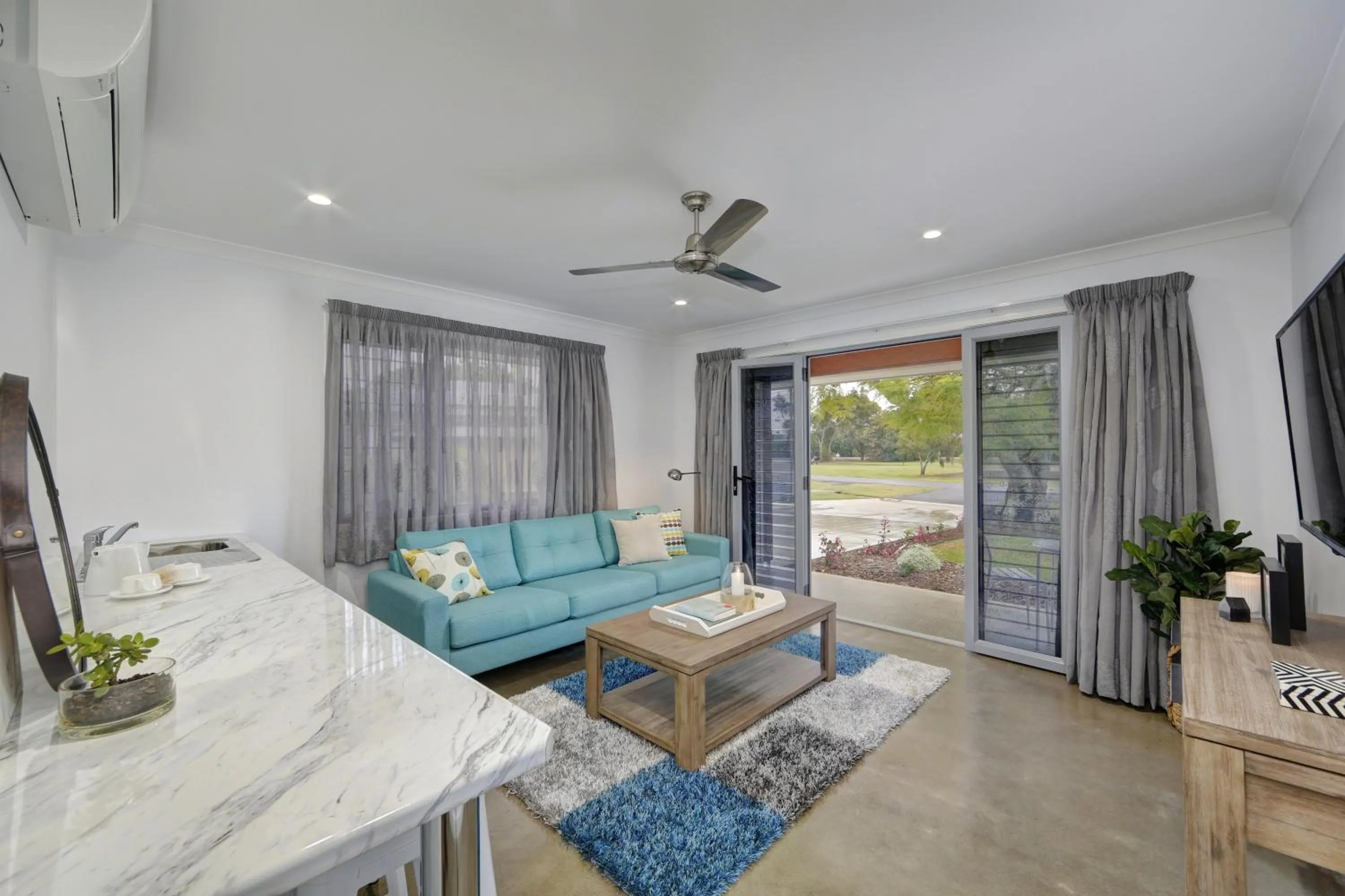 Living room in 12th Tee BnB