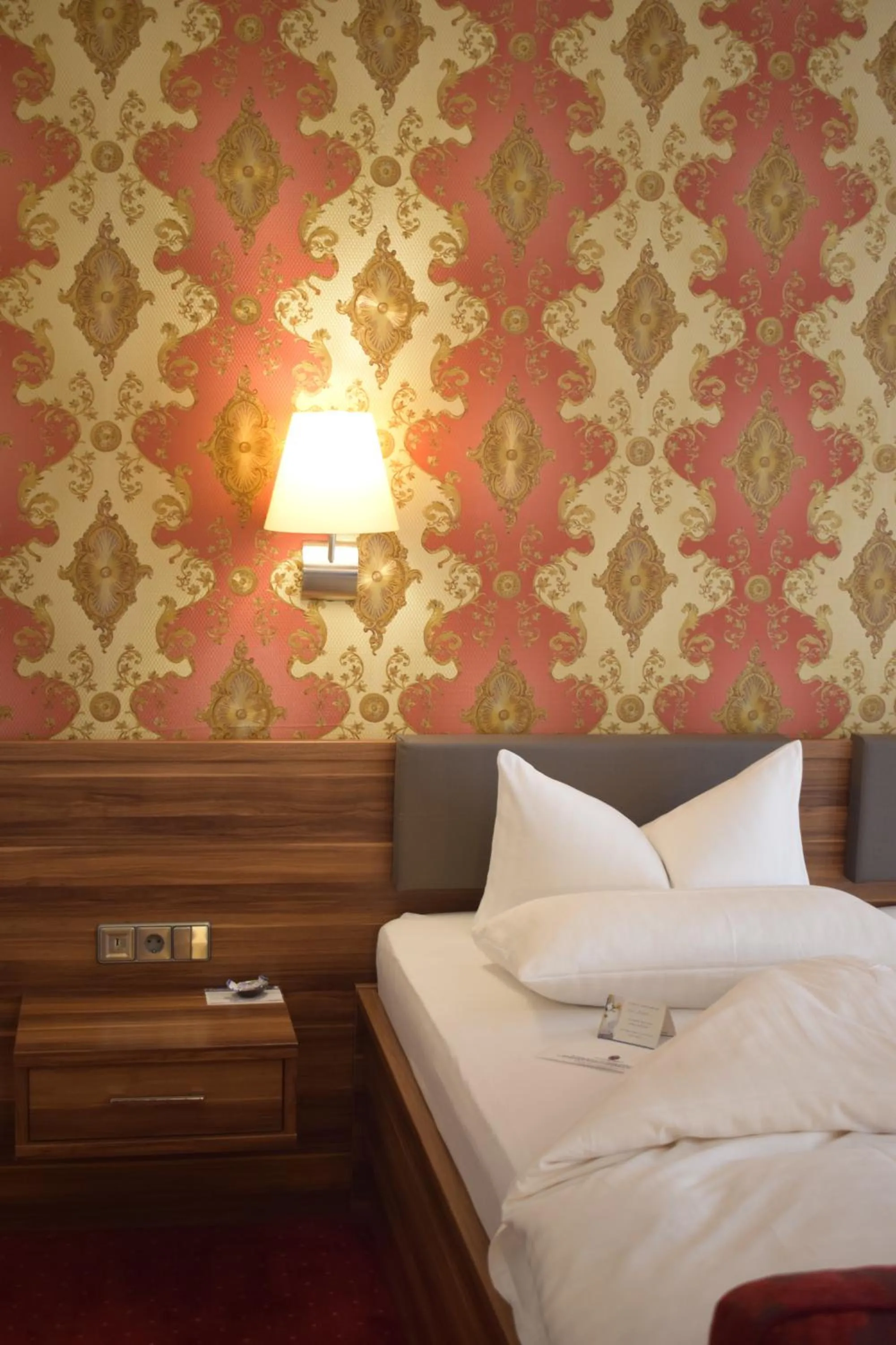 Photo of the whole room, Bed in Akzent Hotel Goldner Hirsch