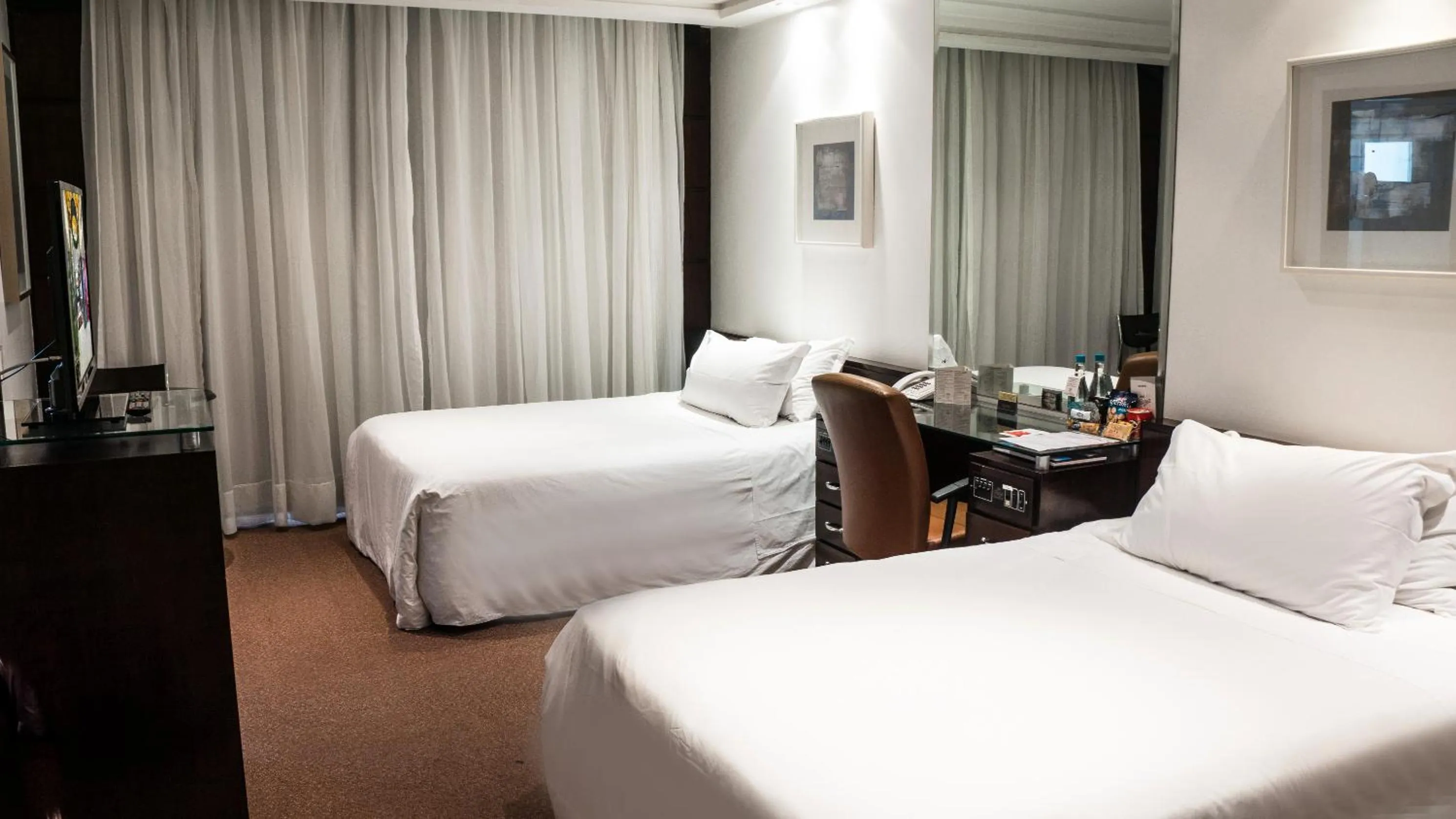 Bed in Plaza São Rafael Hotel