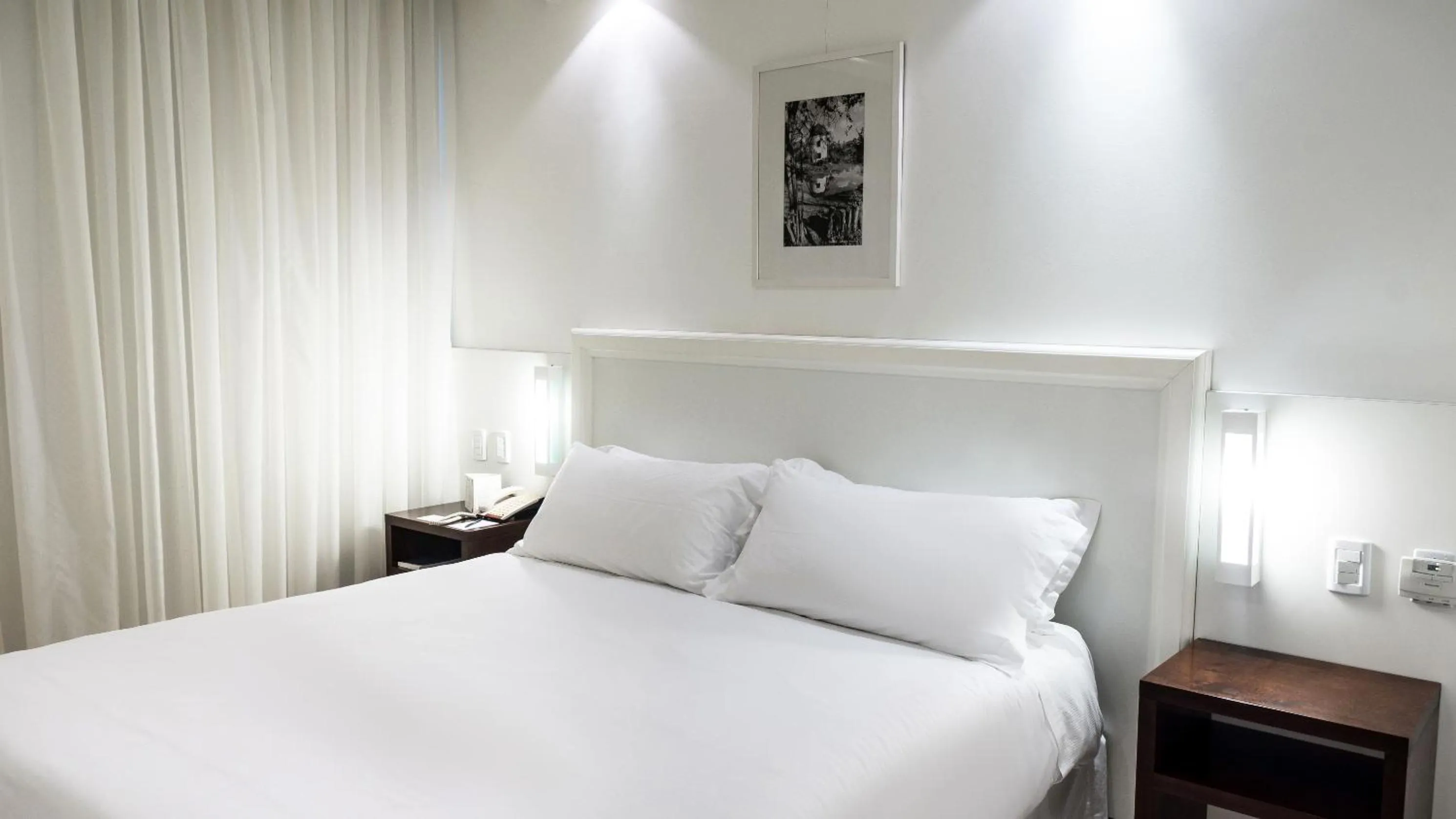 Bed in Plaza São Rafael Hotel