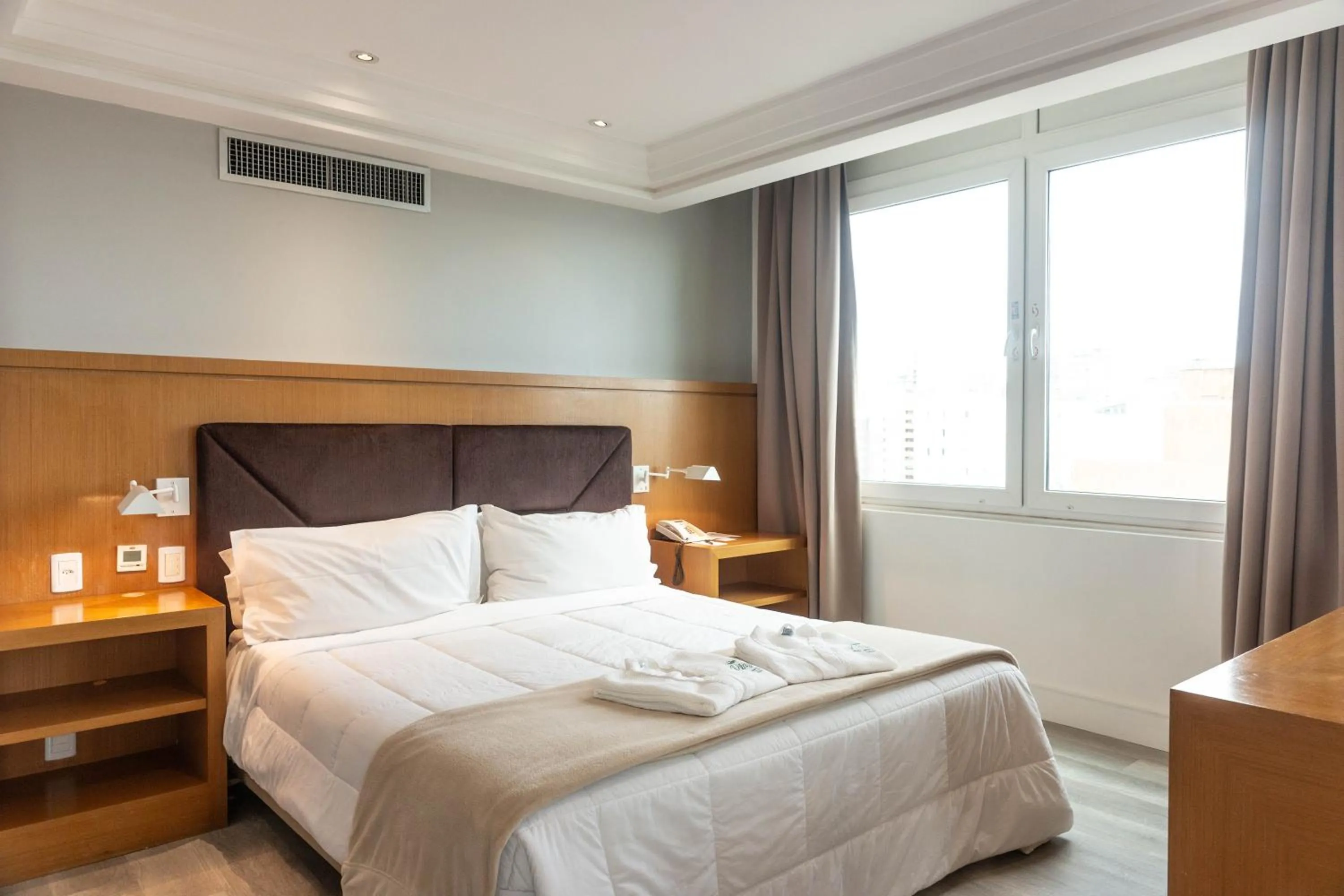 Bed in Plaza São Rafael Hotel