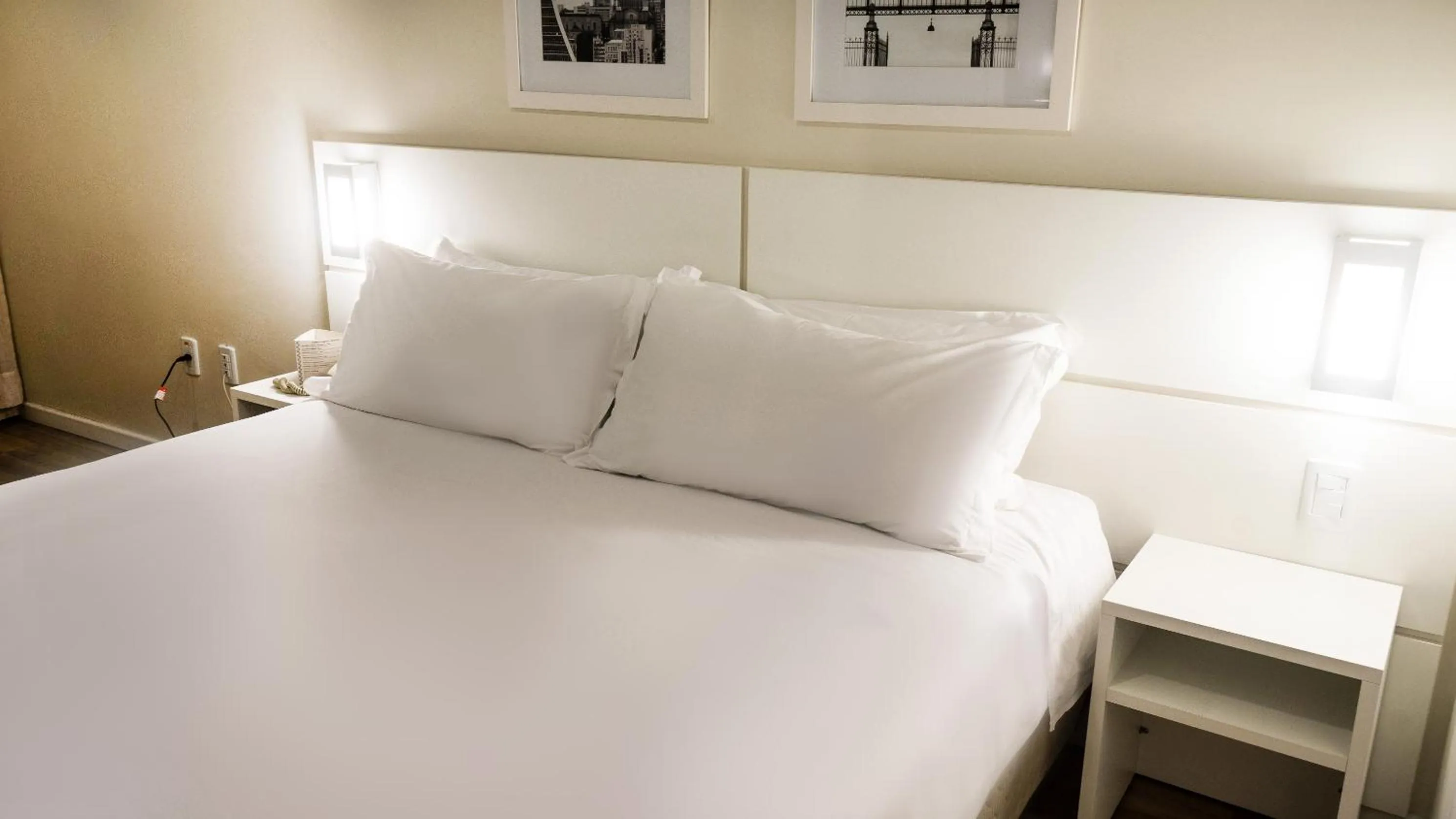 Bed in Plaza São Rafael Hotel