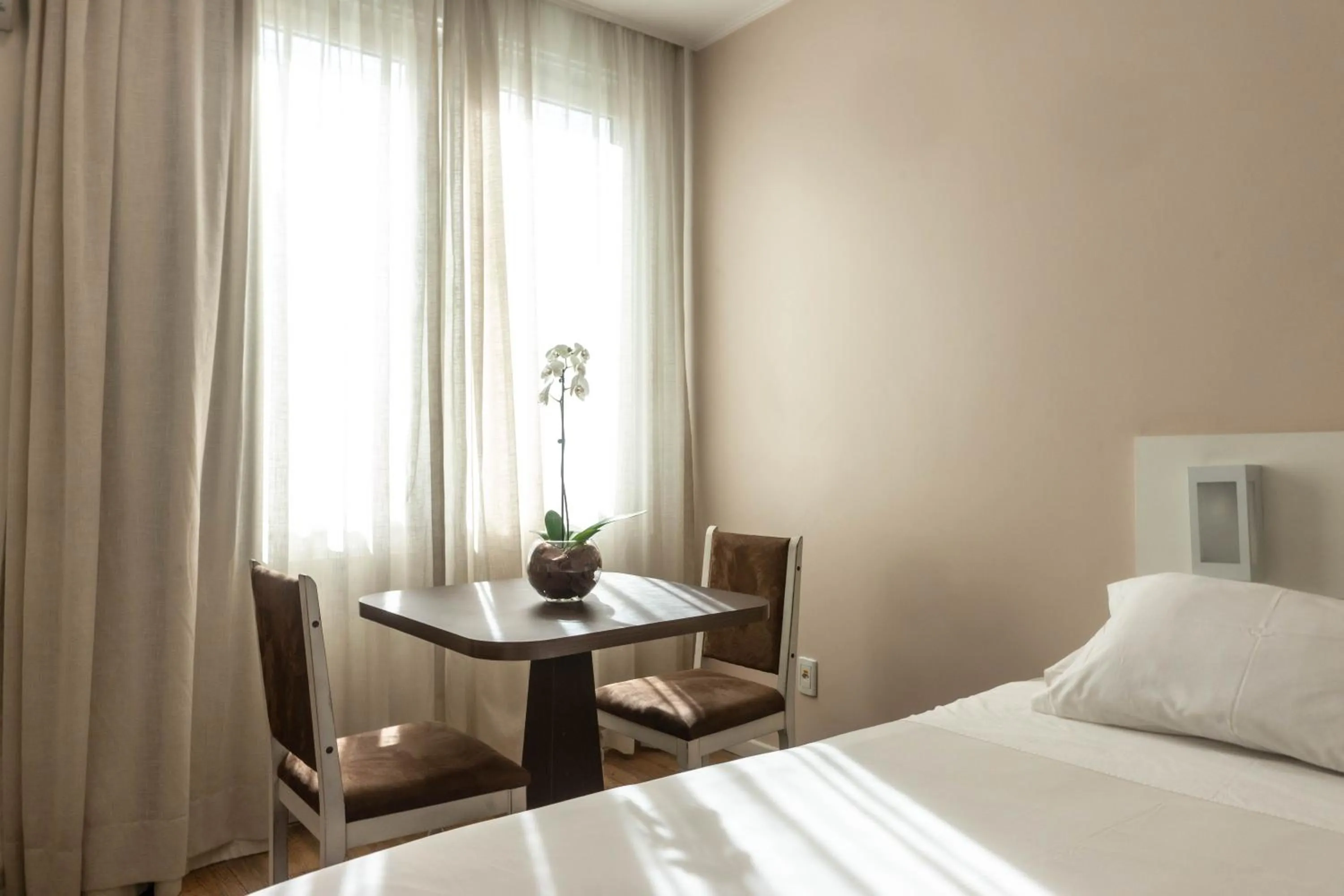 Bed in Plaza São Rafael Hotel