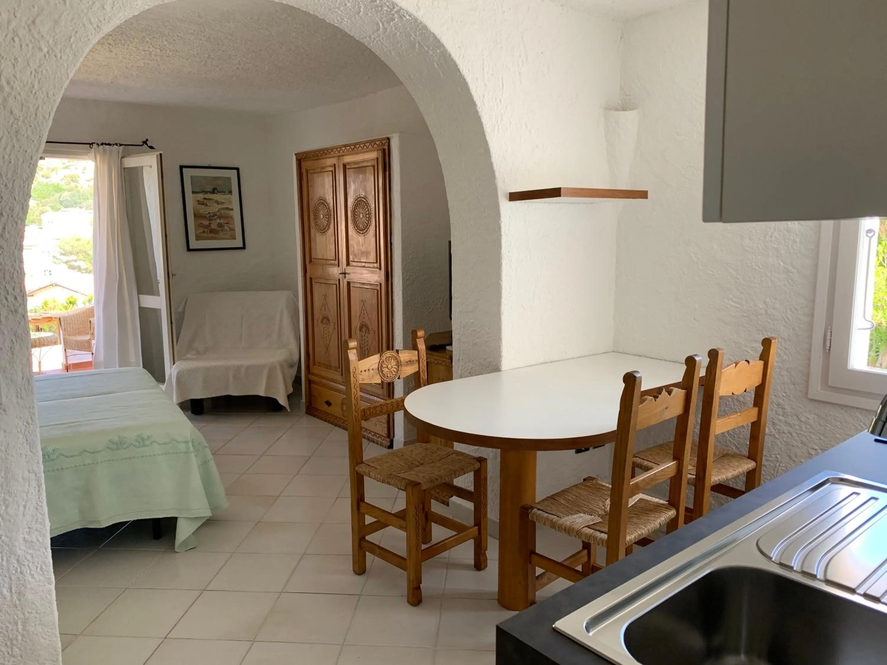 Seating area, Bed in Hotel Punta Est