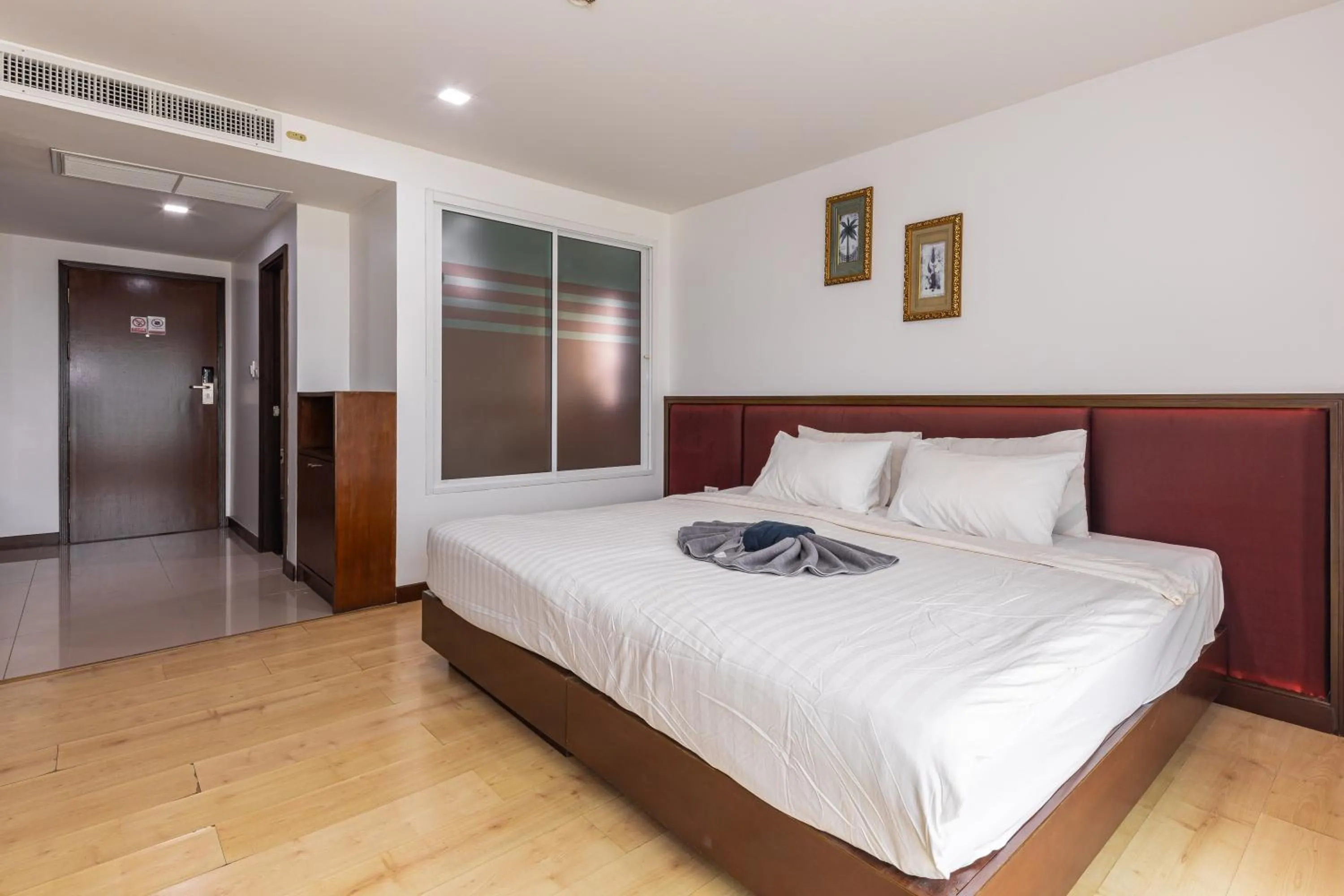 Bed in The Kris Resort Hotel