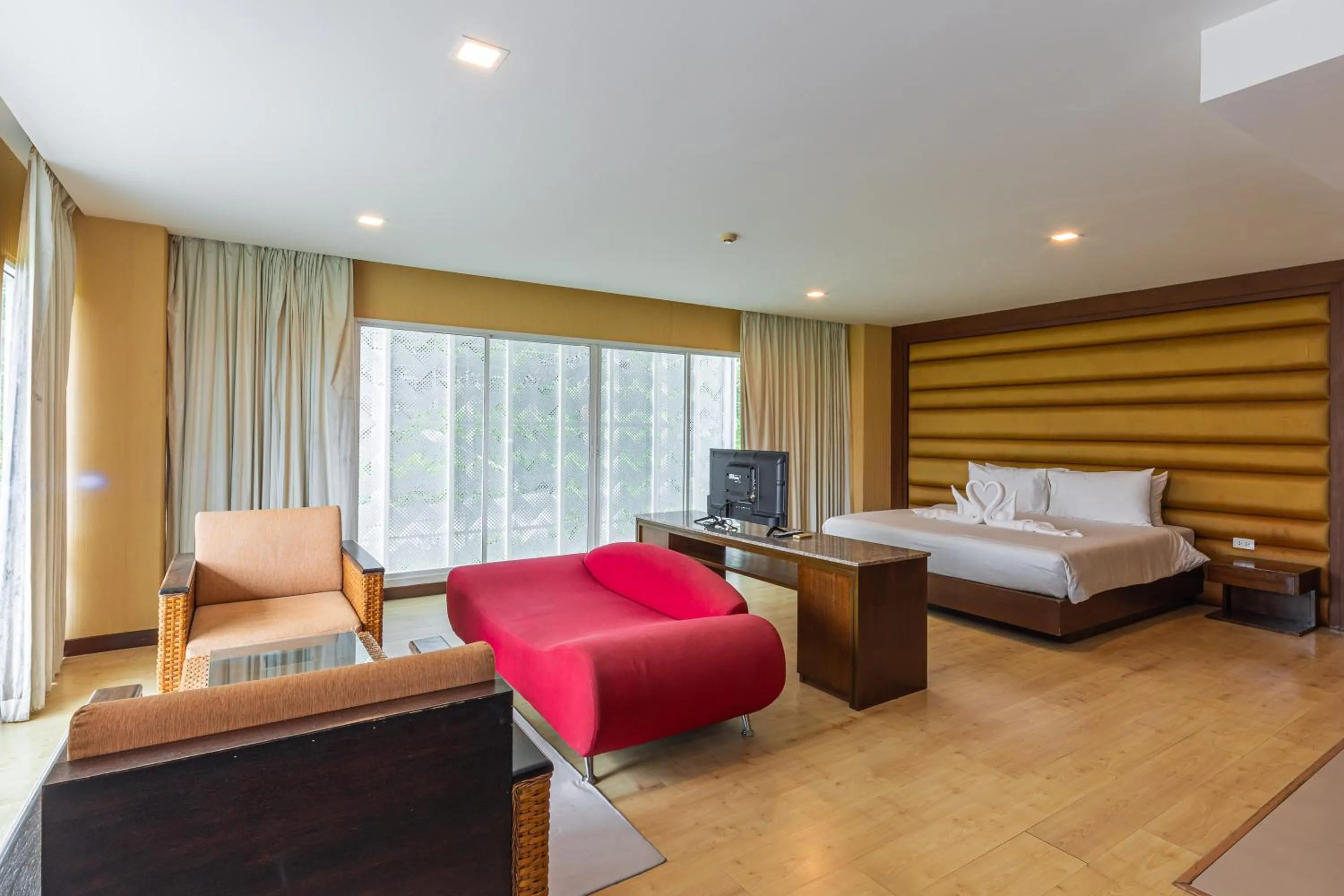 Bed in The Kris Resort Hotel