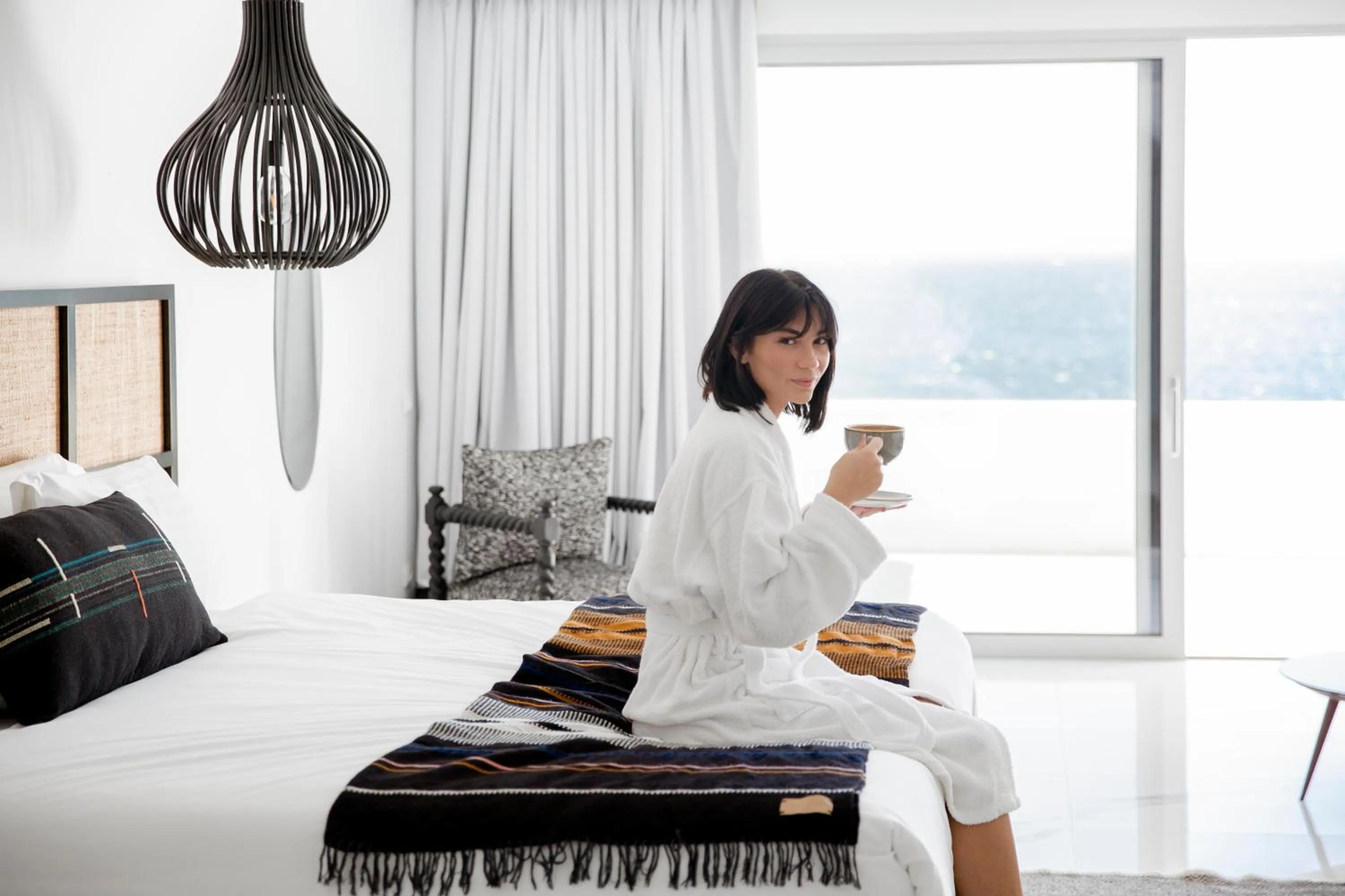 Bed in Kouros Hotel & Suites