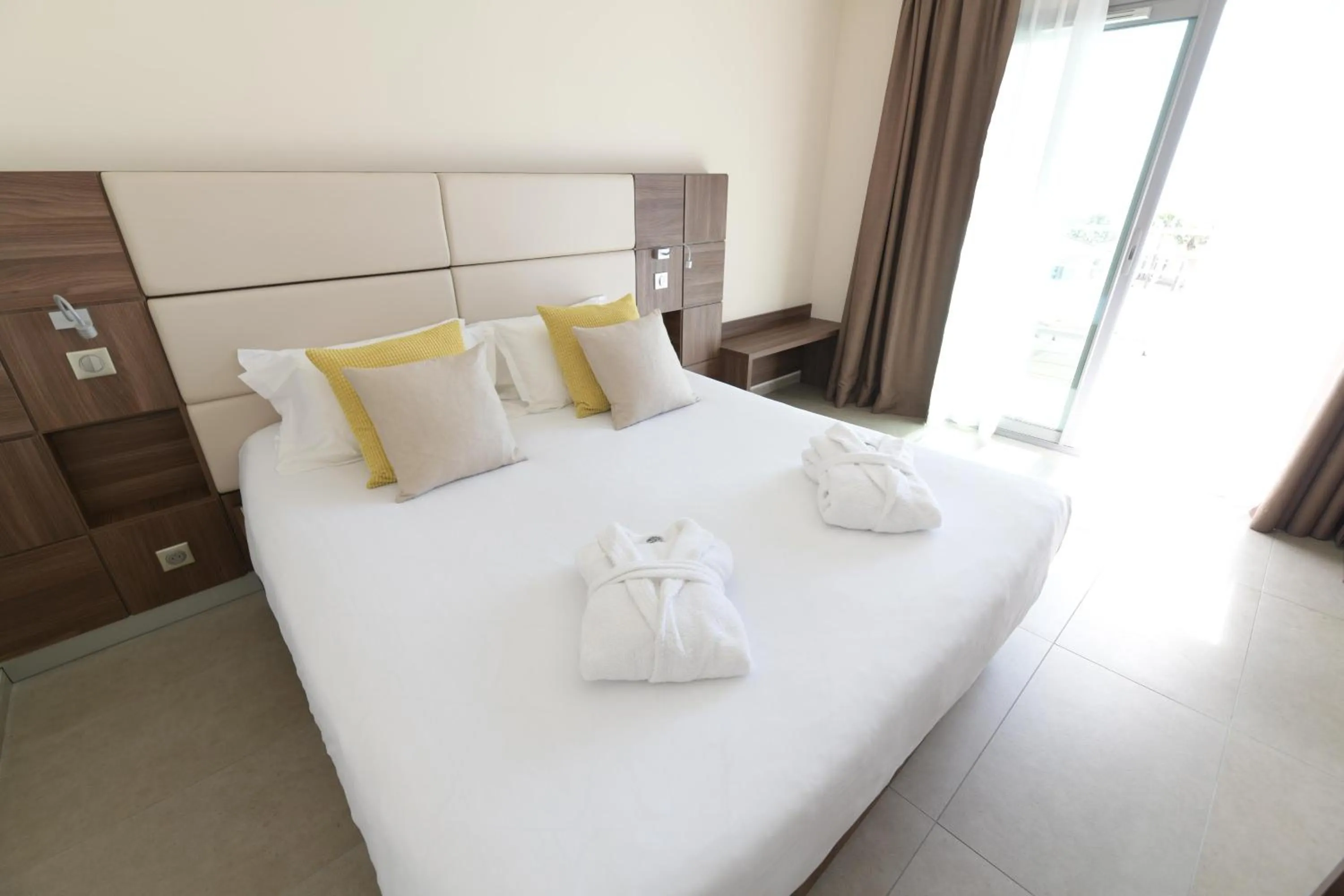 Bed in Hotel Port Toga