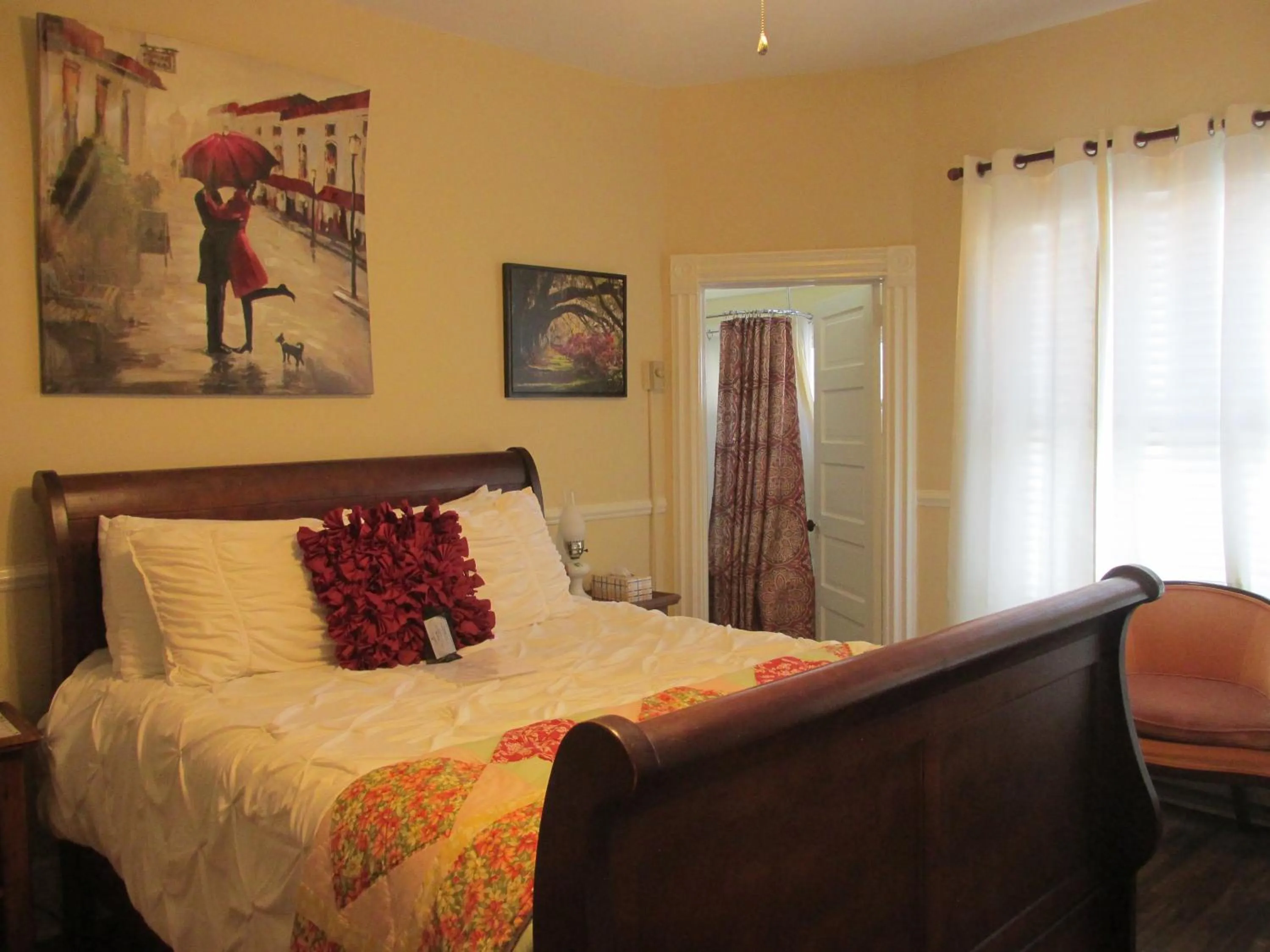 Bed in The Charleston Inn Hendersonville NC