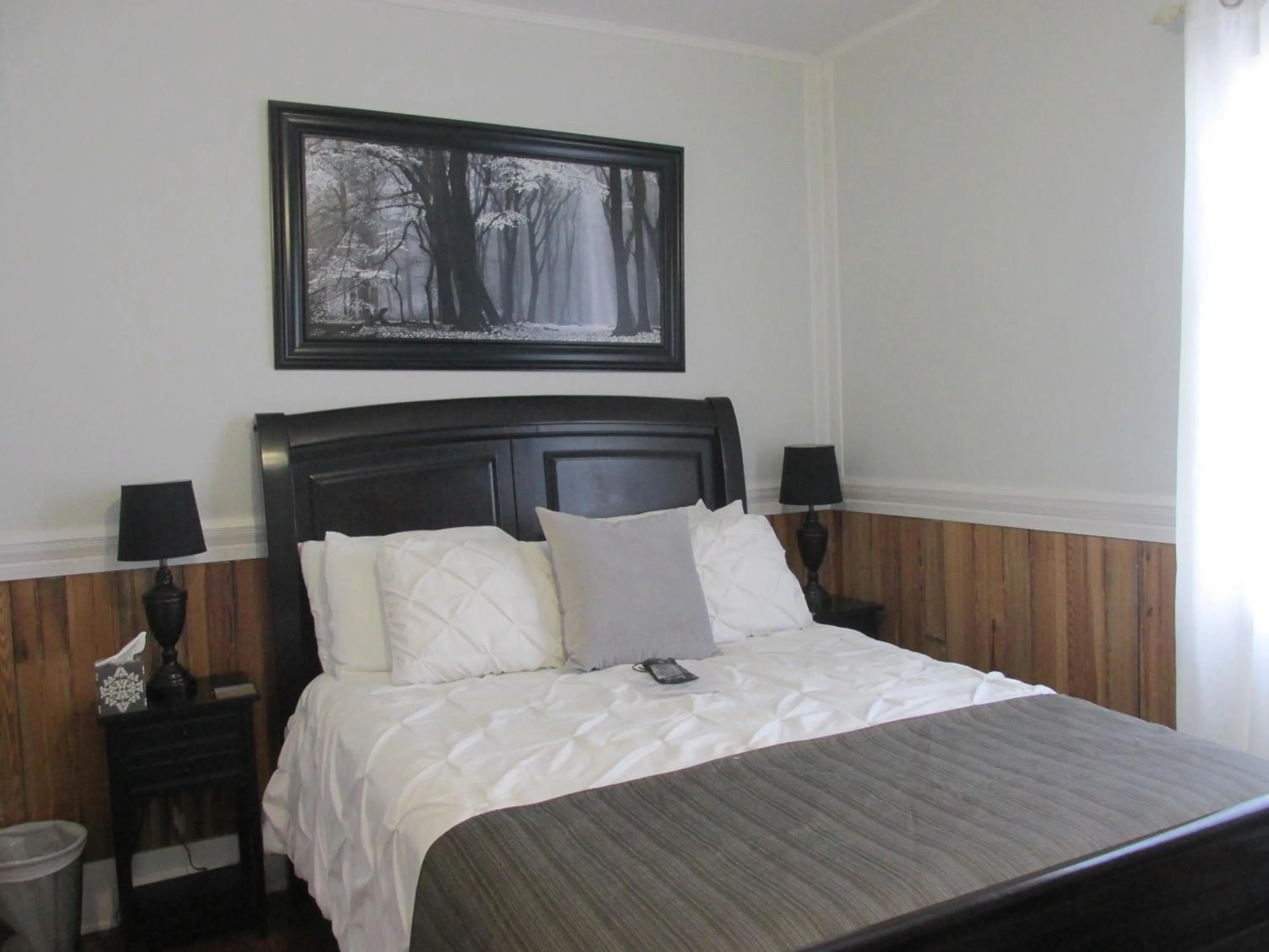 Bed in The Charleston Inn Hendersonville NC