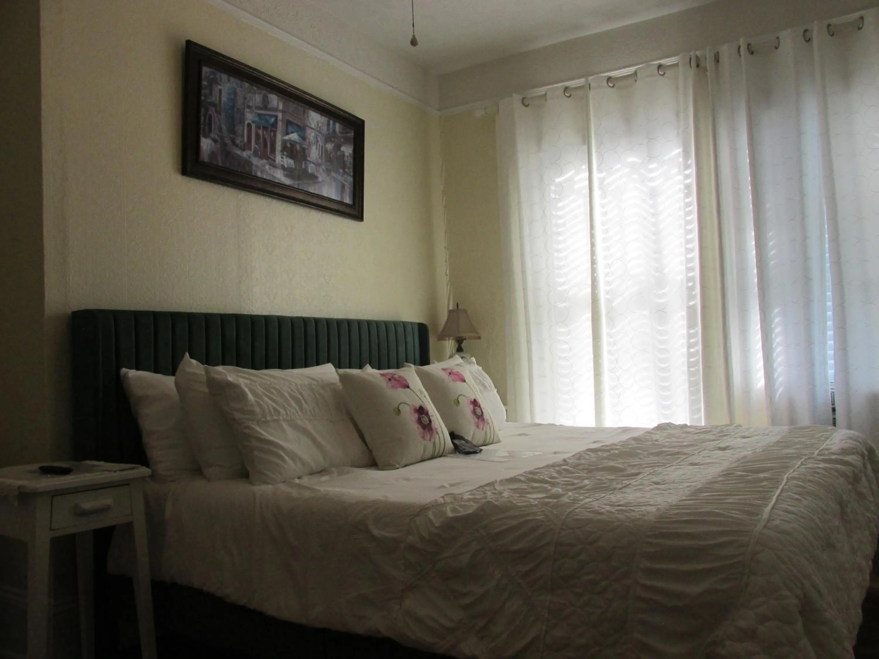 Bed in The Charleston Inn Hendersonville NC