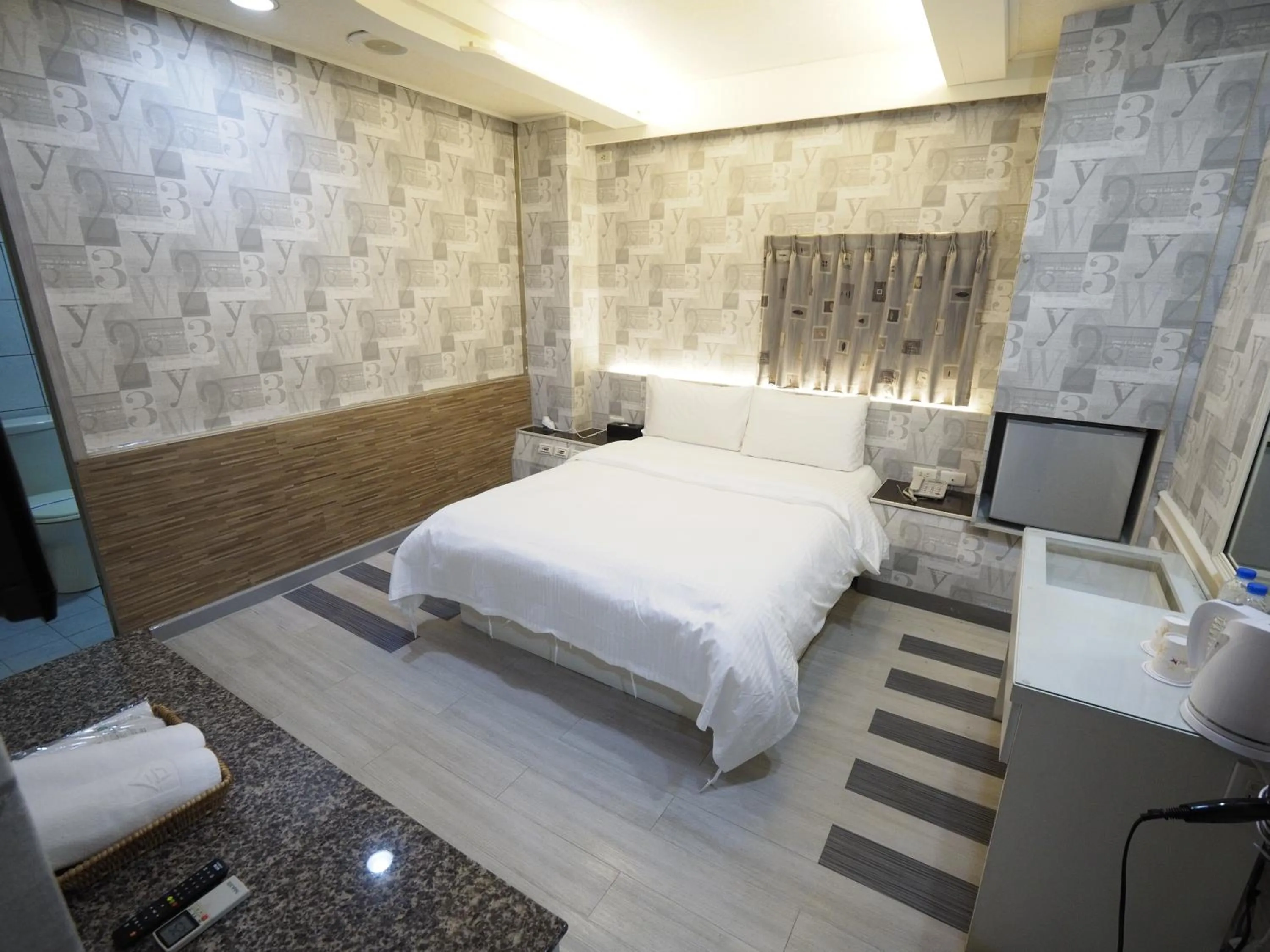 Bed in 合悅都會商旅 Heyue HOTEL