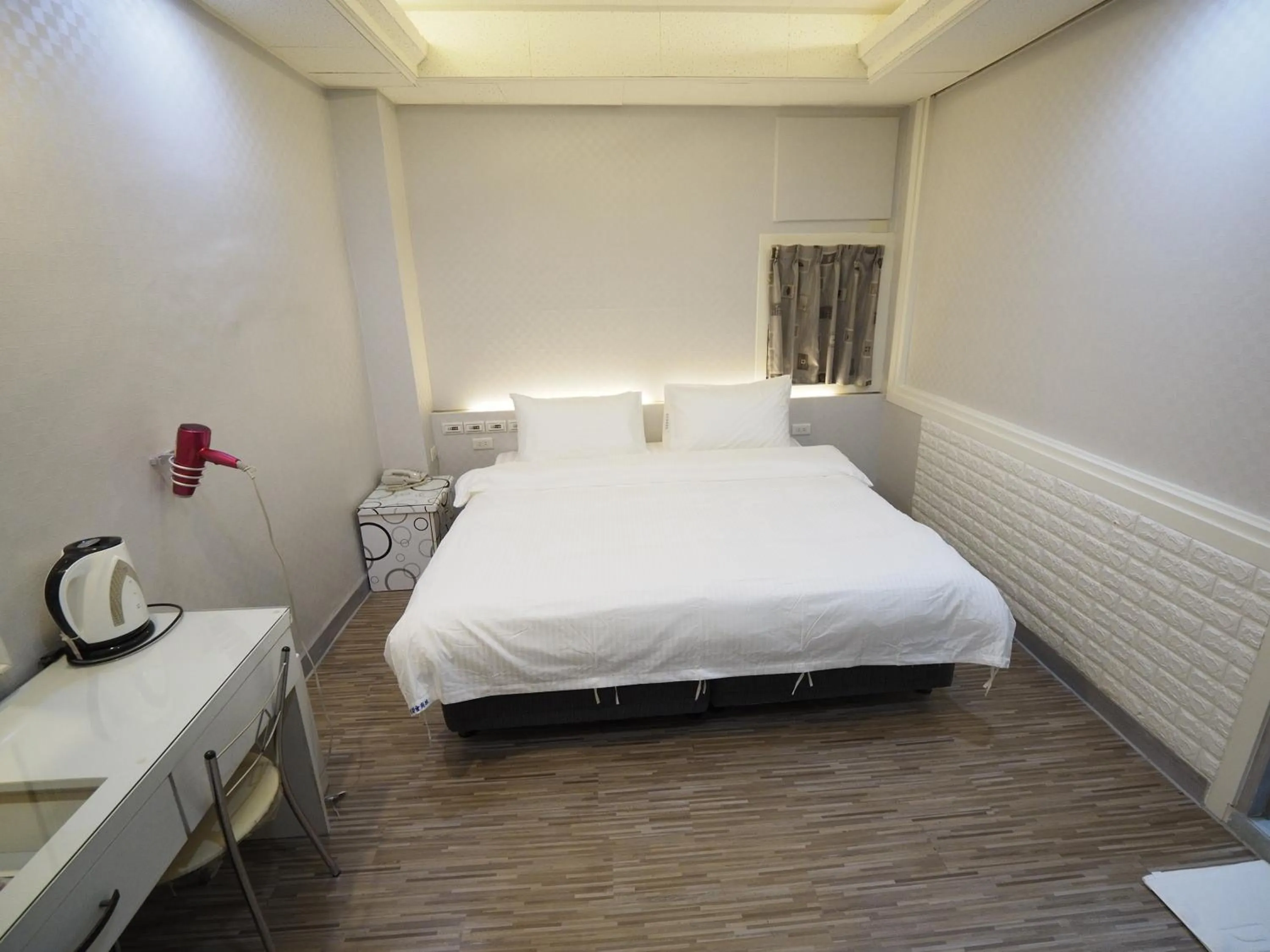 Bed in 合悅都會商旅 Heyue HOTEL