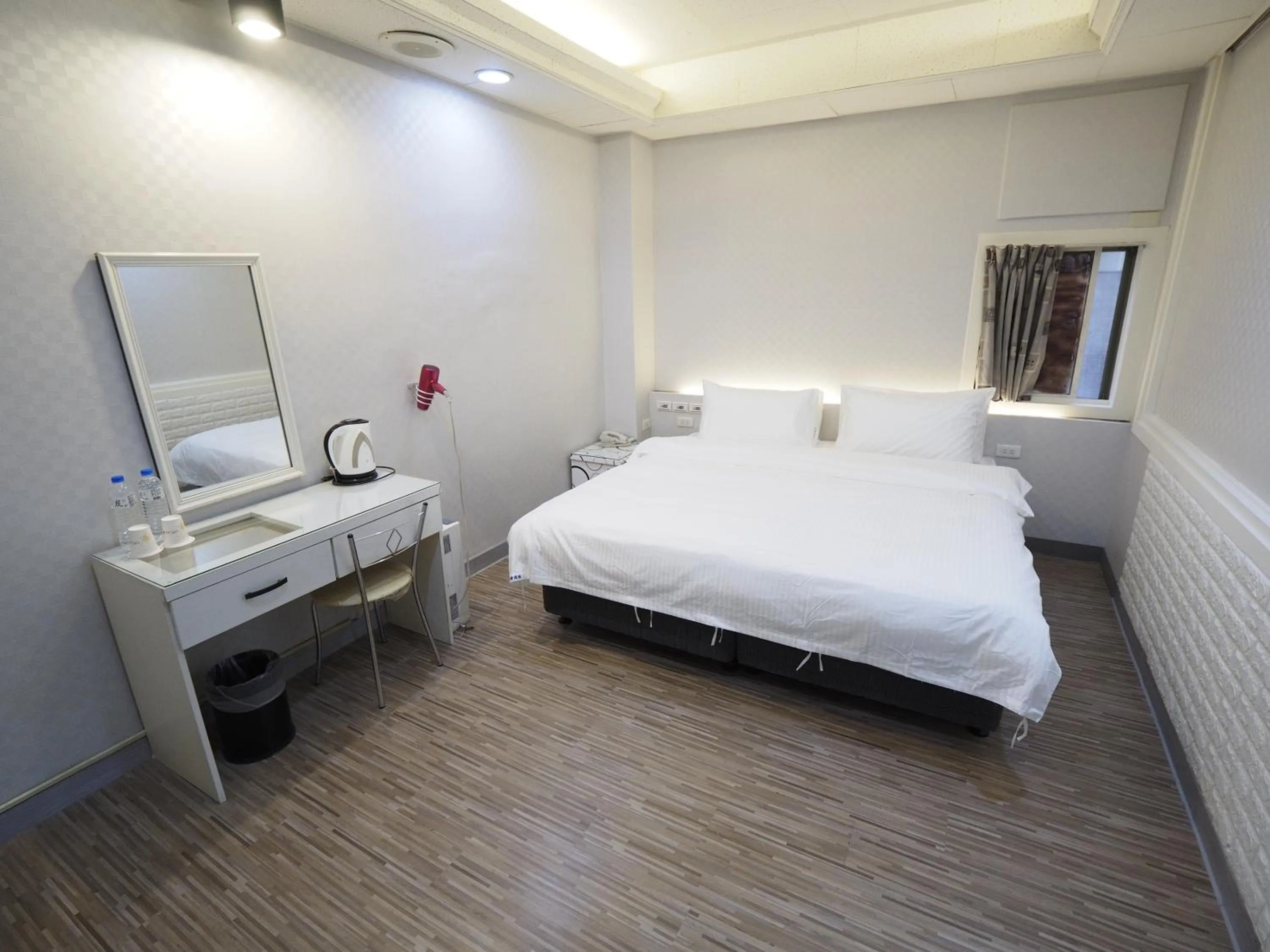 Bed in 合悅都會商旅 Heyue HOTEL