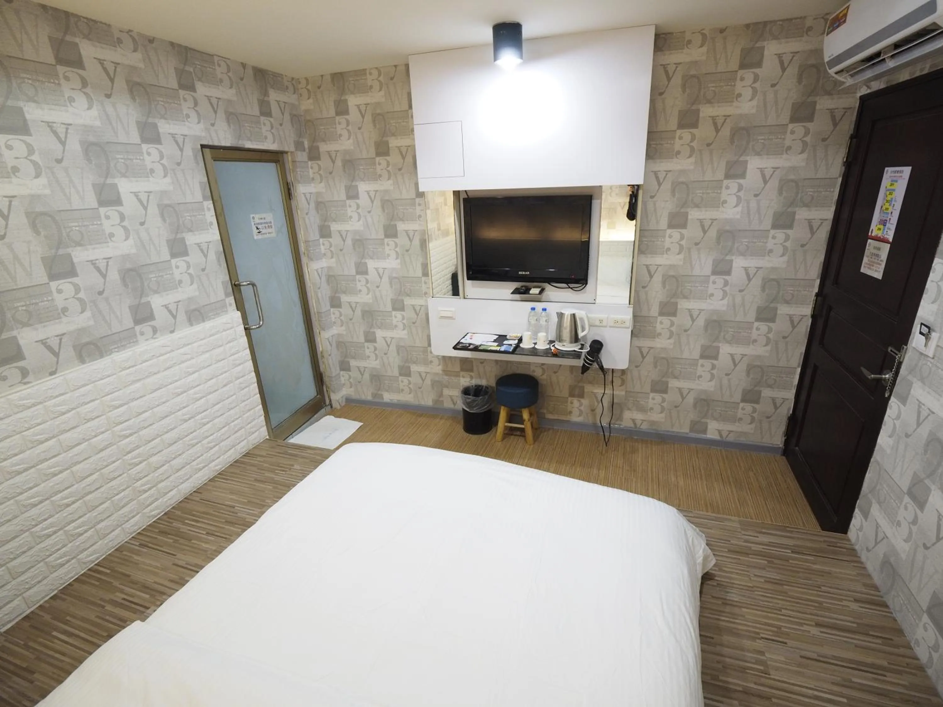 Bed in 合悅都會商旅 Heyue HOTEL