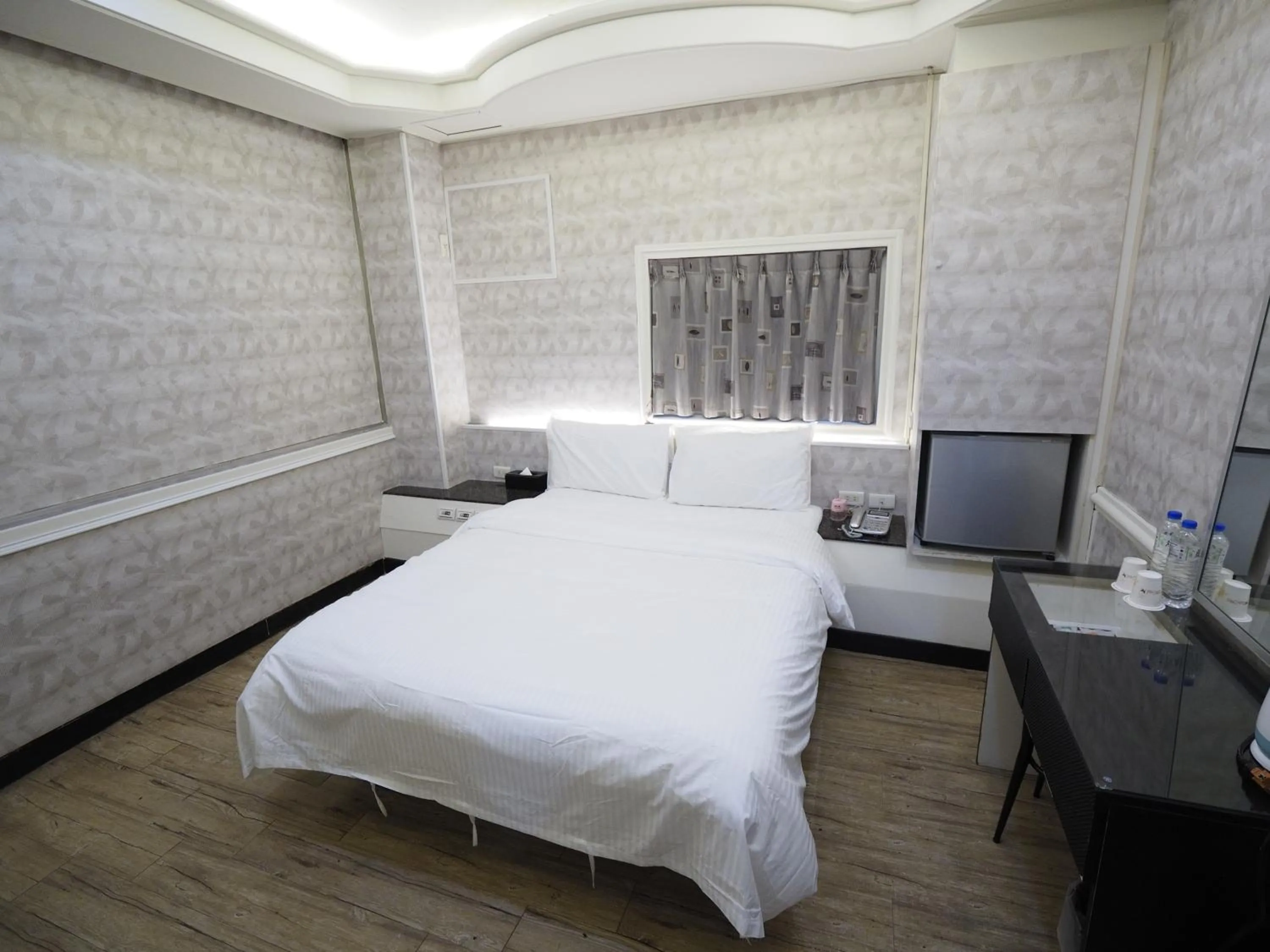 Bed in 合悅都會商旅 Heyue HOTEL