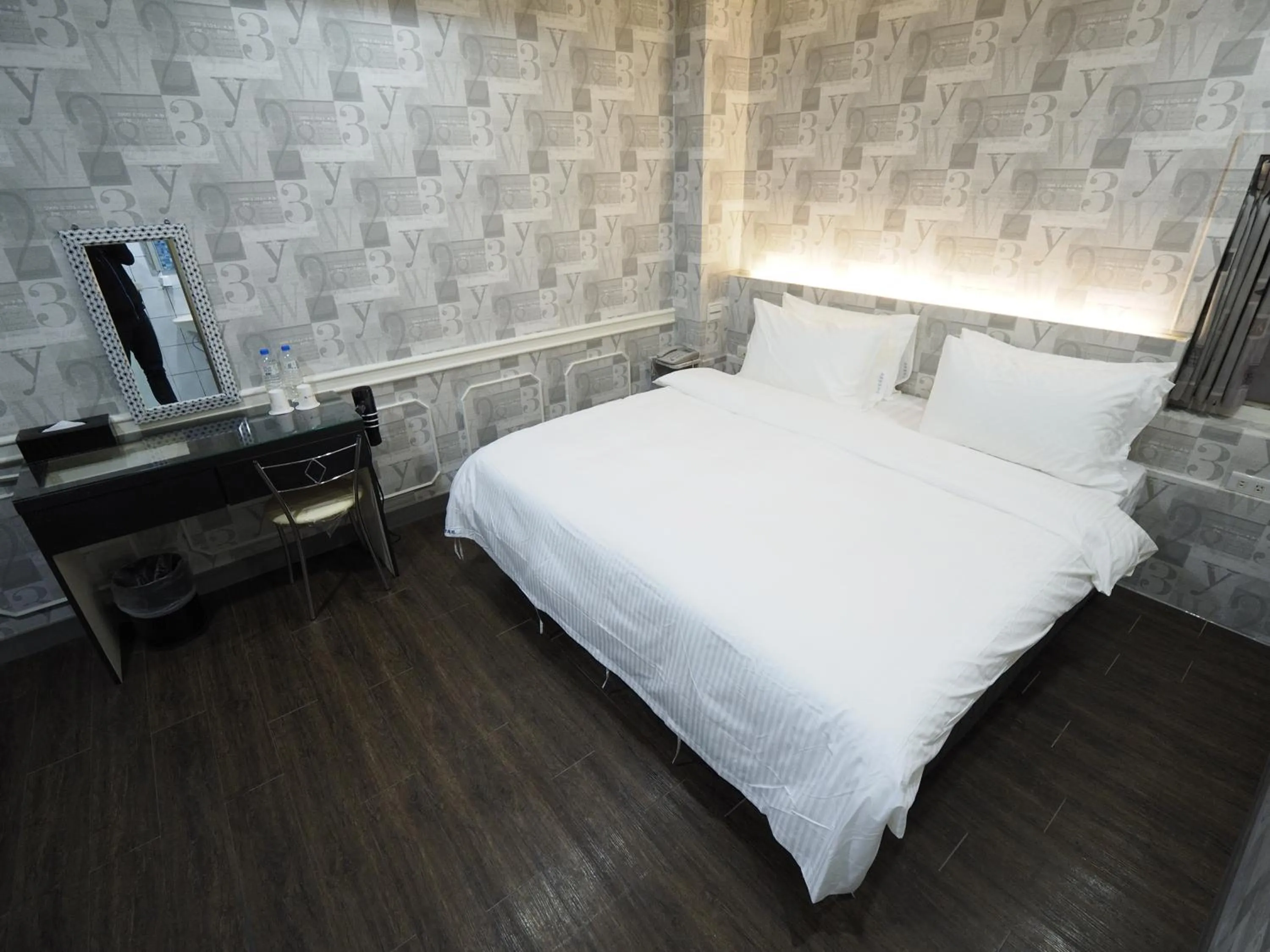 Bed in 合悅都會商旅 Heyue HOTEL