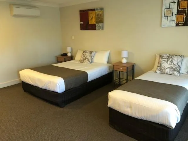 Bed in Alexander Cameron Suites