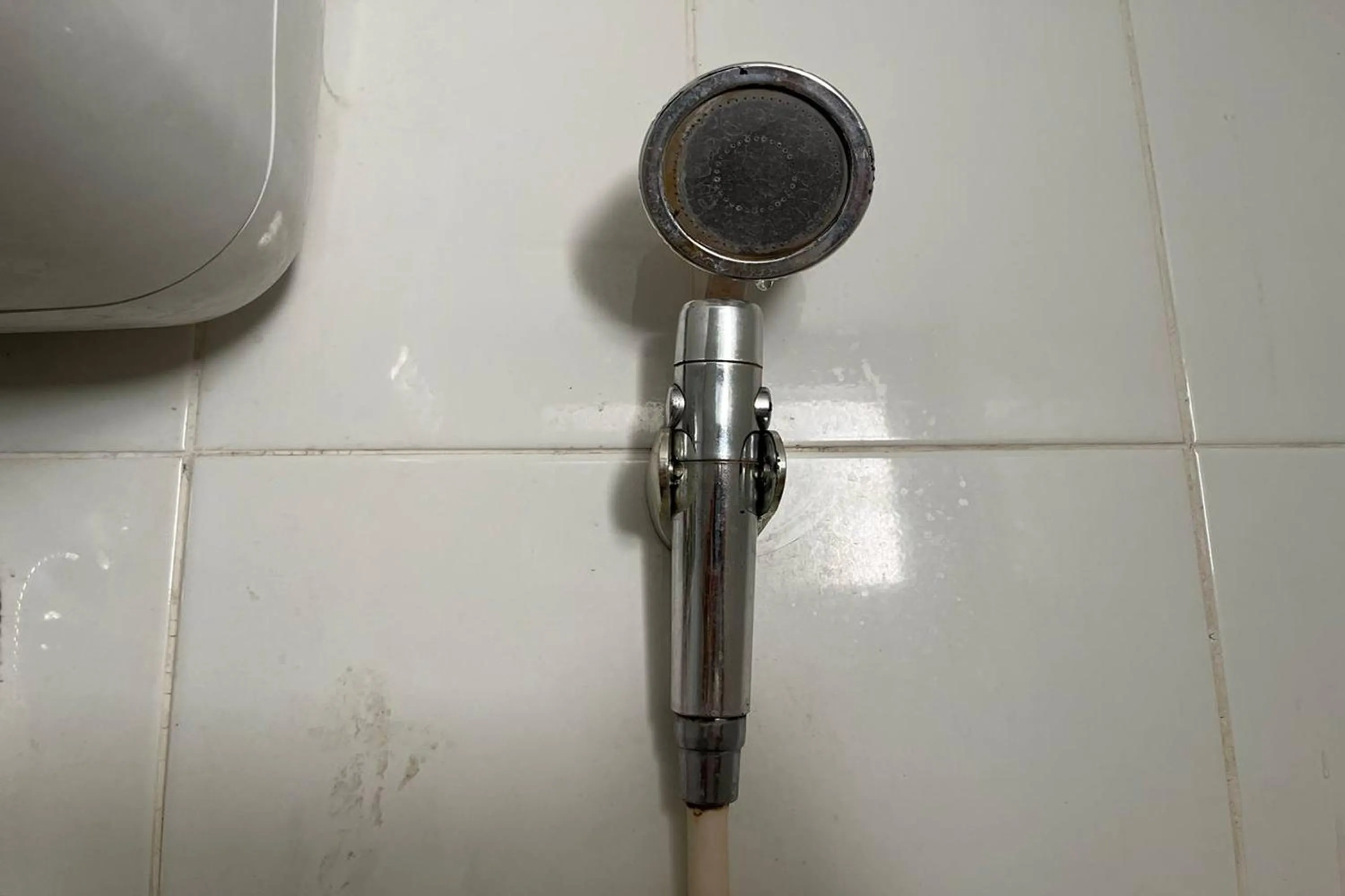 Shower in Apartment Bassura City by Berkah Estate