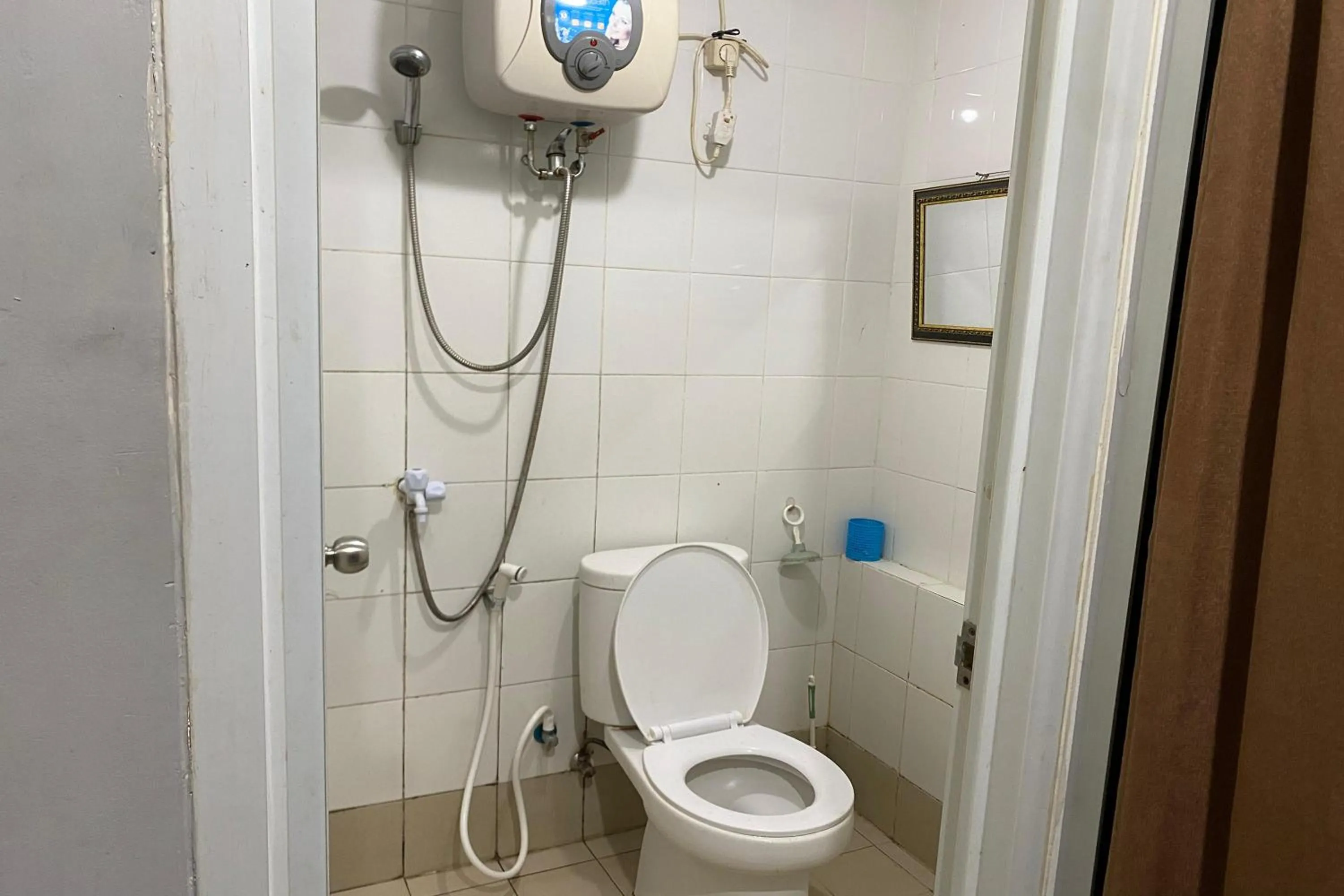 Shower in Apartment Bassura City by Berkah Estate