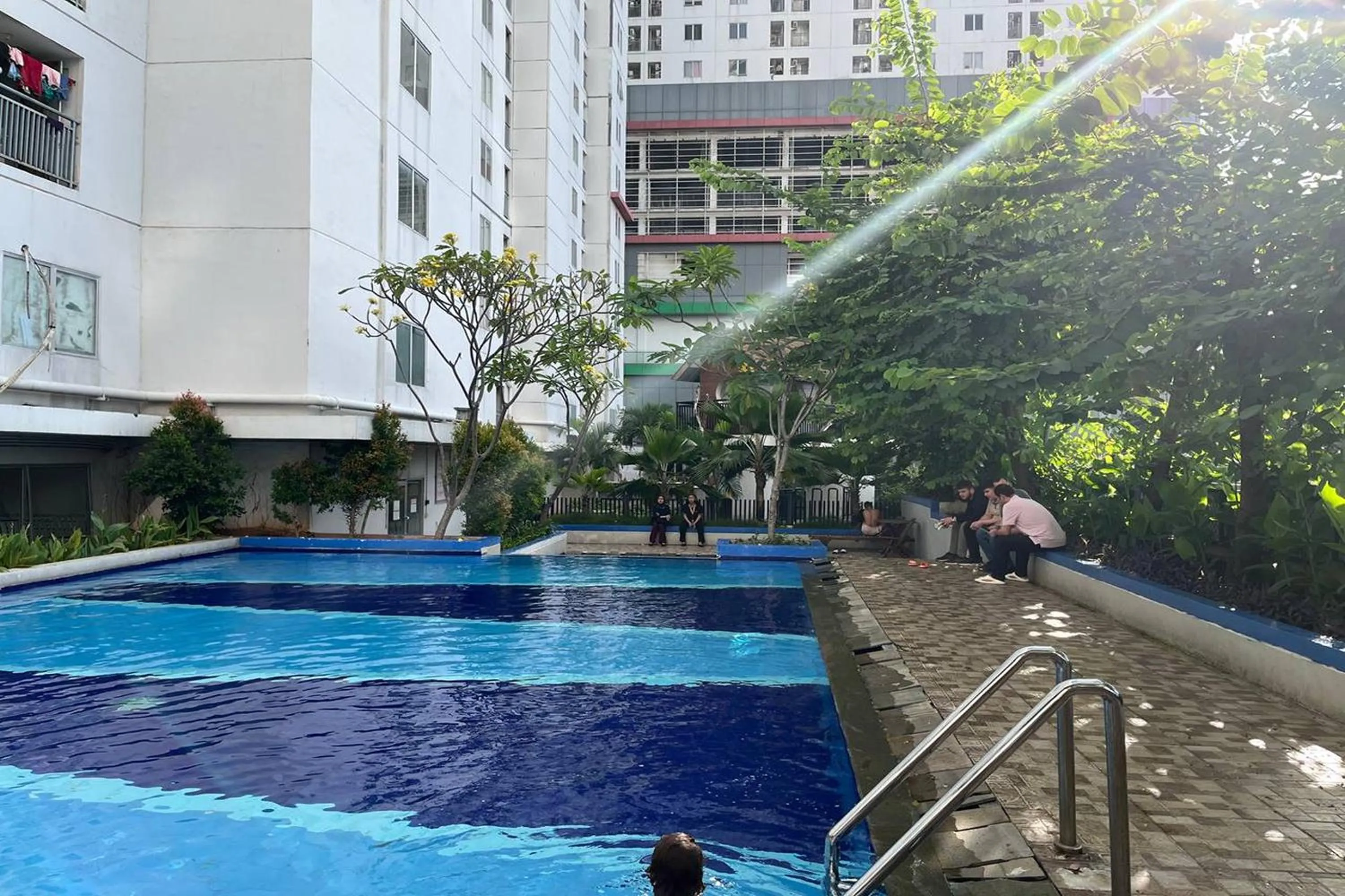 Swimming pool in Apartment Bassura City by Berkah Estate