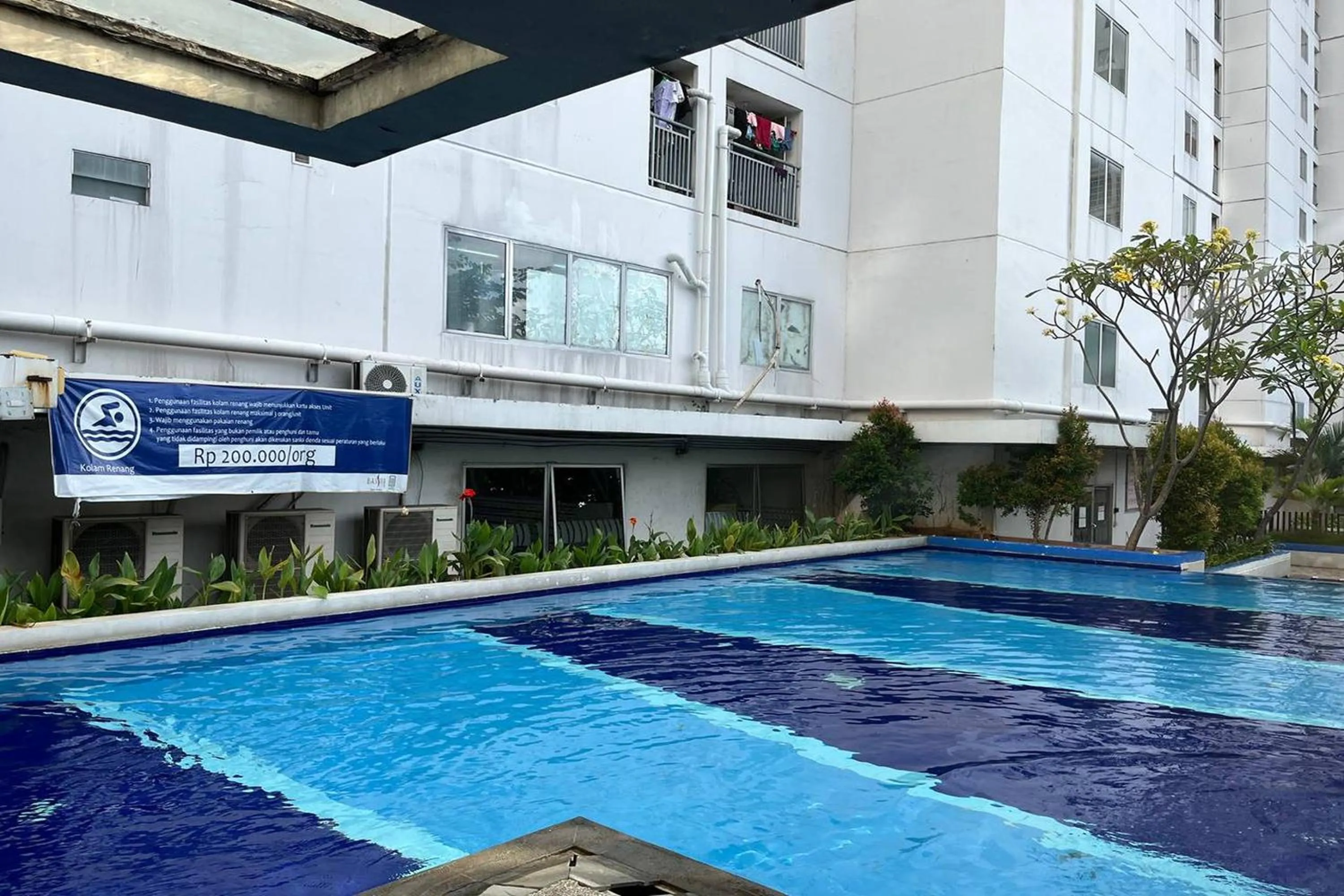 Swimming pool in Apartment Bassura City by Berkah Estate