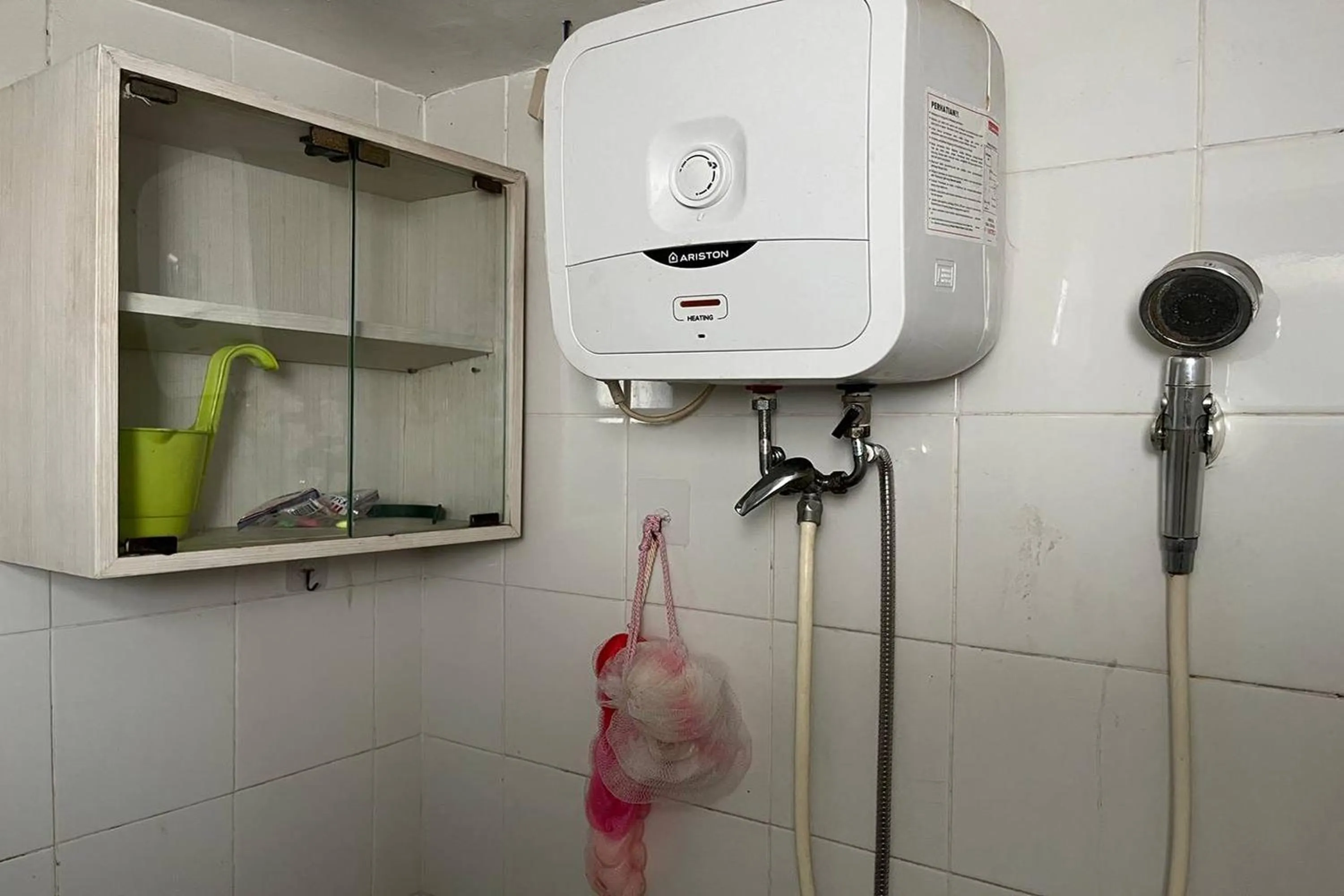 Shower in Apartment Bassura City by Berkah Estate