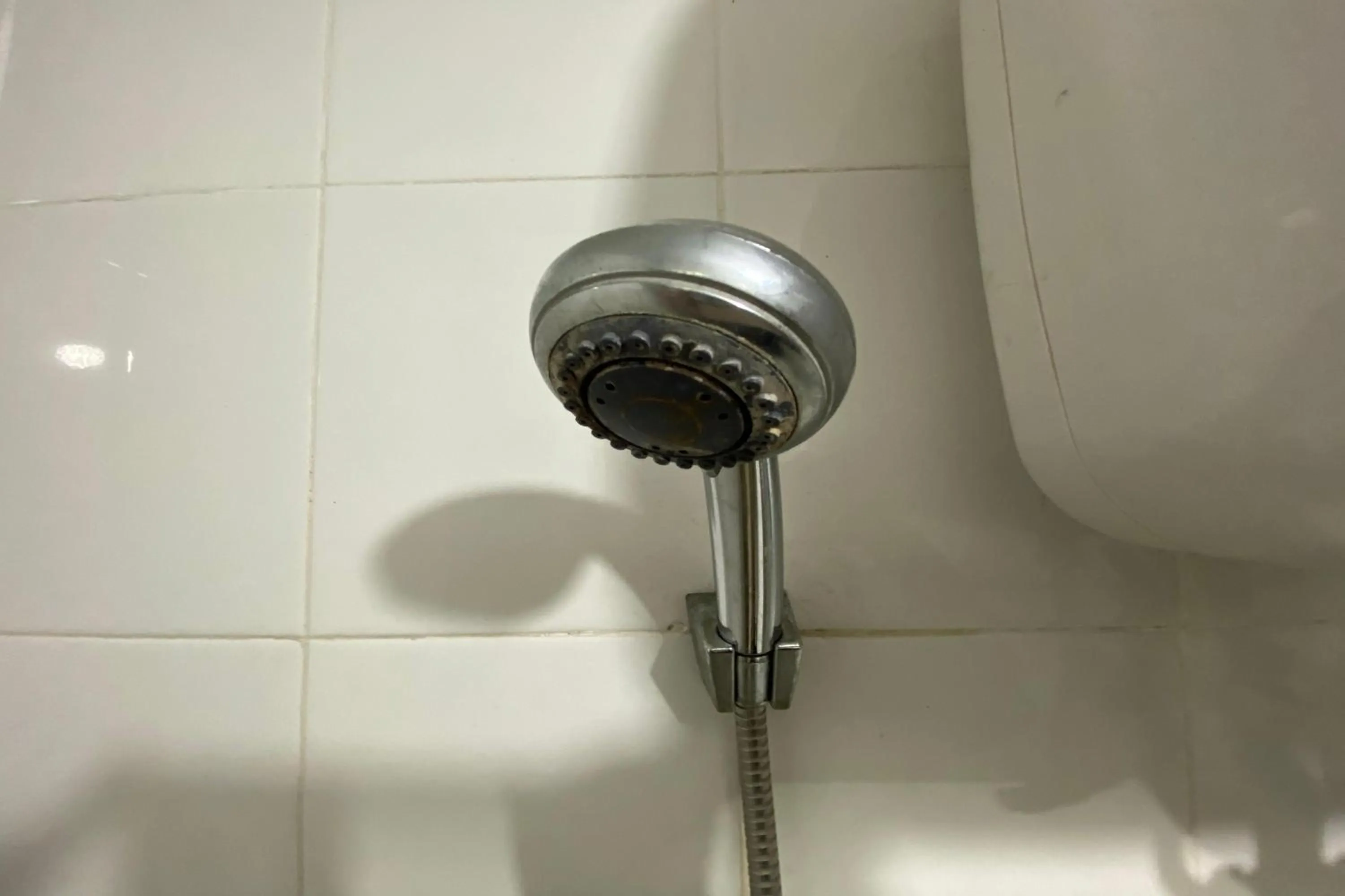 Shower in Apartment Bassura City by Berkah Estate