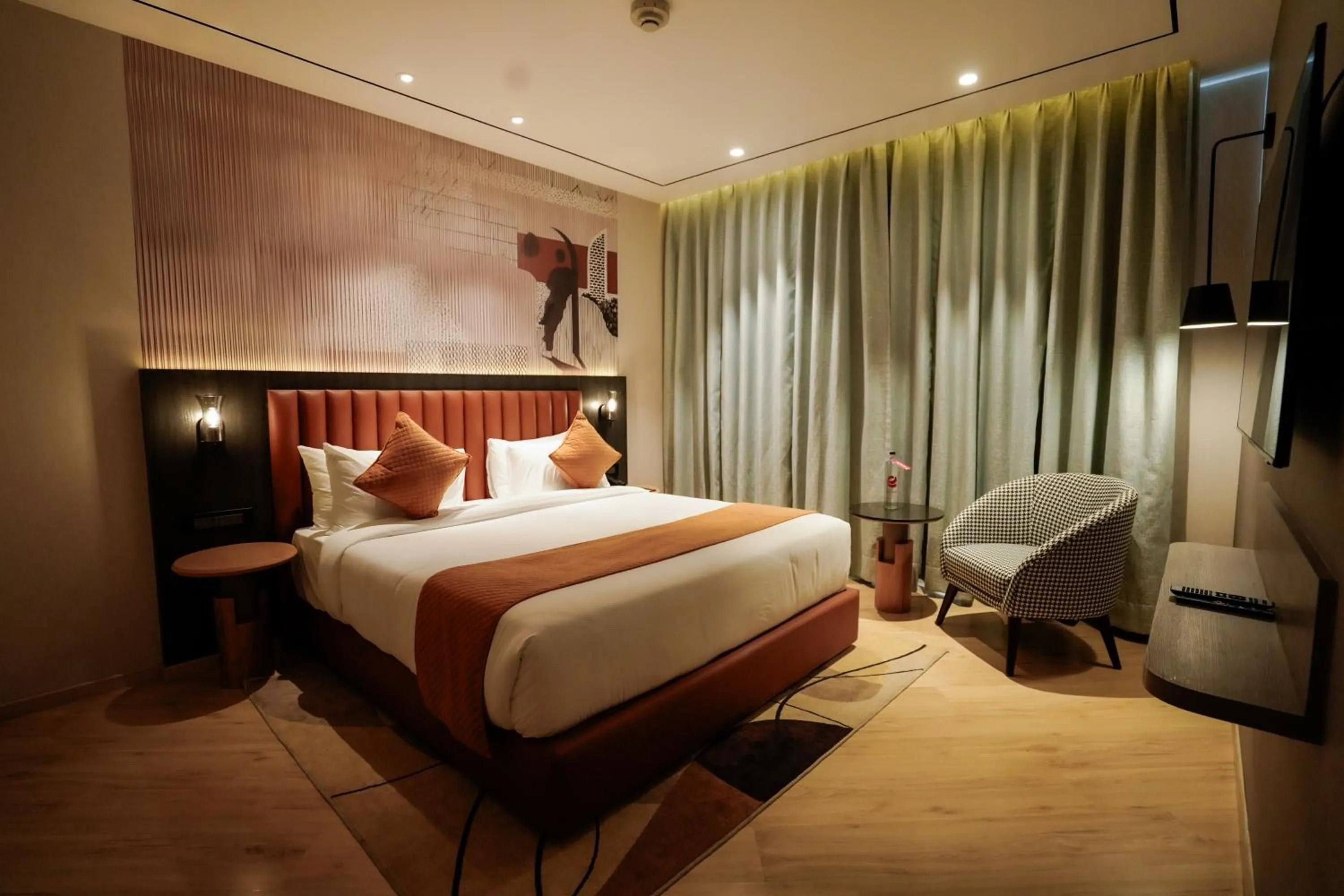 Photo of the whole room, Bed in Ramada Encore by Wyndham Chandigarh Zirakpur