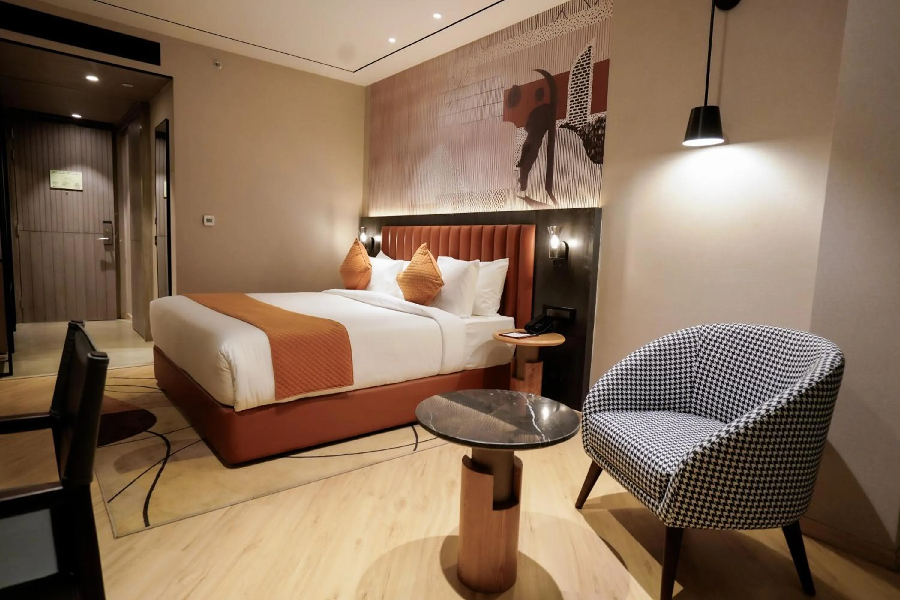 Photo of the whole room, Bed in Ramada Encore by Wyndham Chandigarh Zirakpur