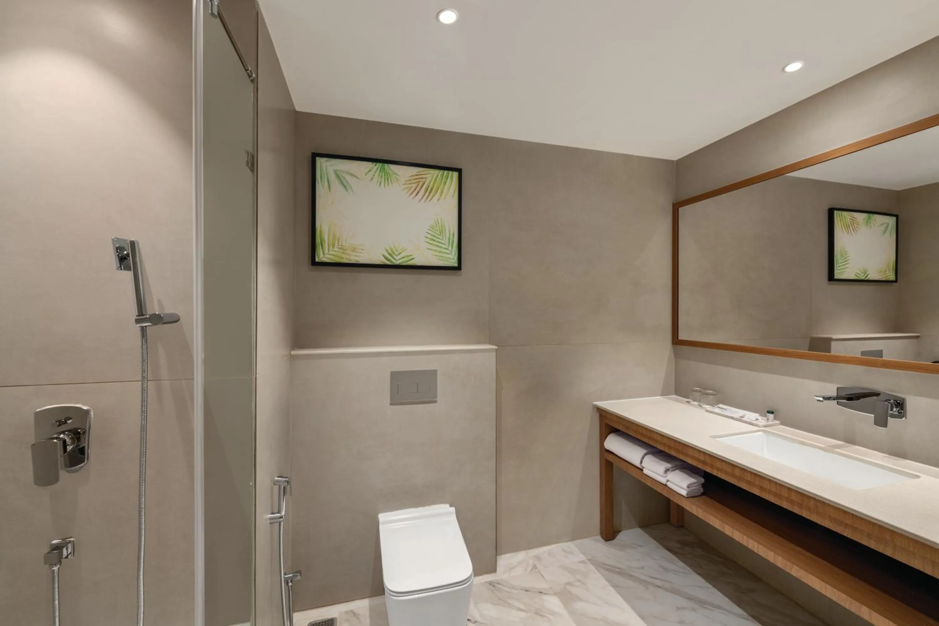 Shower, Bed in Ramada by Wyndham Ranchi